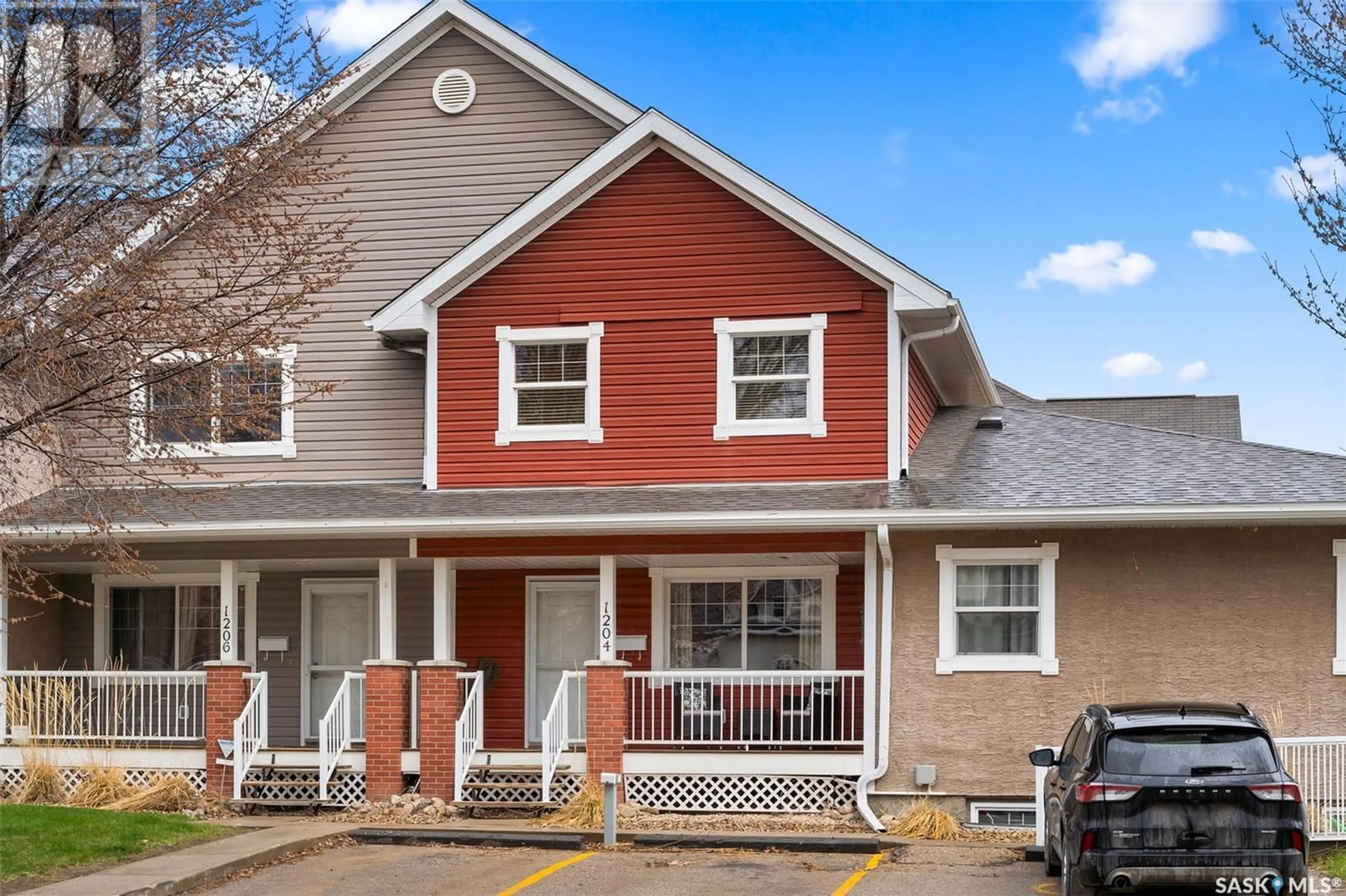 Home with vinyl exterior material, street for 1204 14TH AVENUE, Regina Saskatchewan S4P0B8