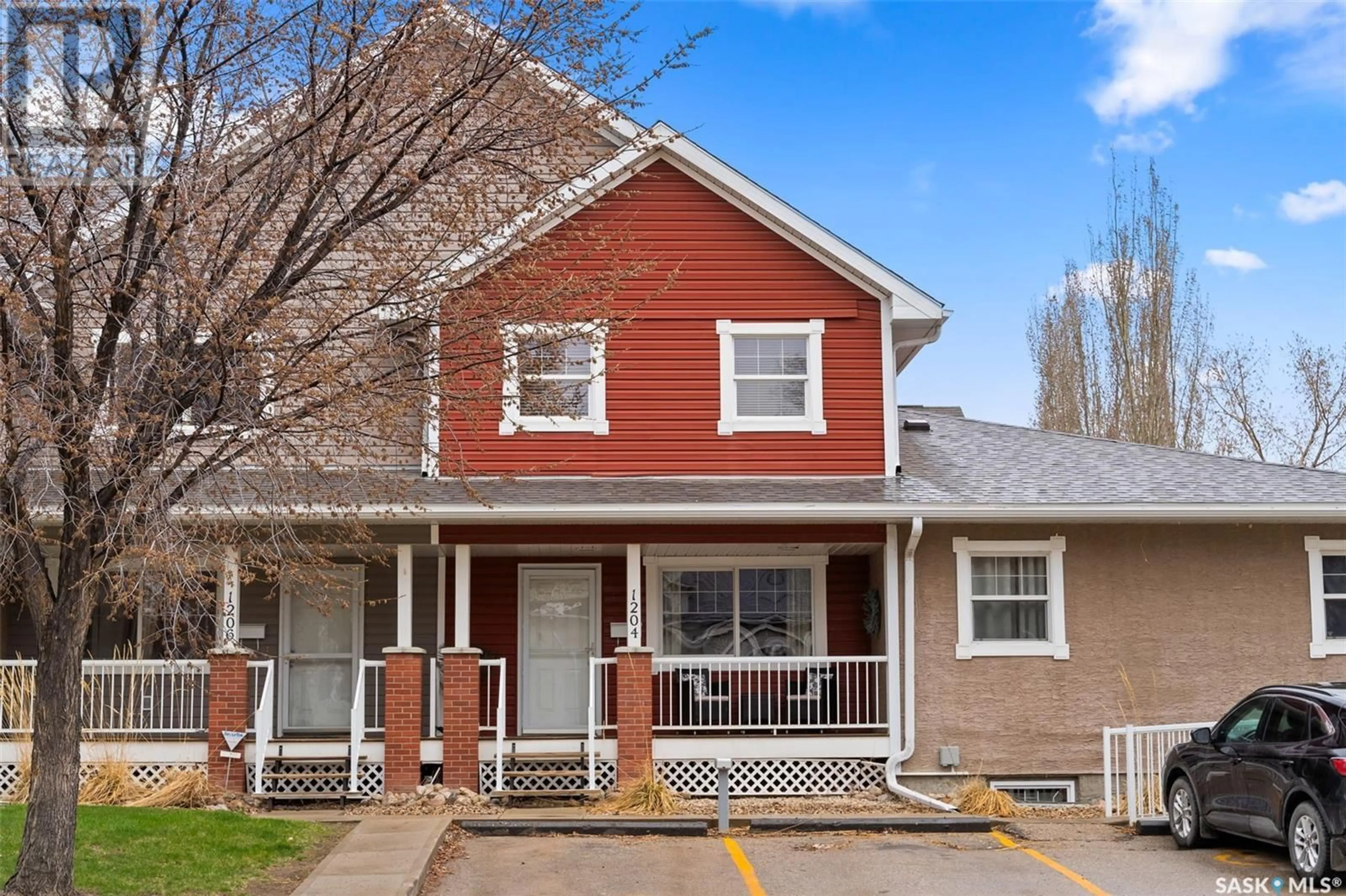 Home with brick exterior material, street for 1204 14TH AVENUE, Regina Saskatchewan S4P0B8