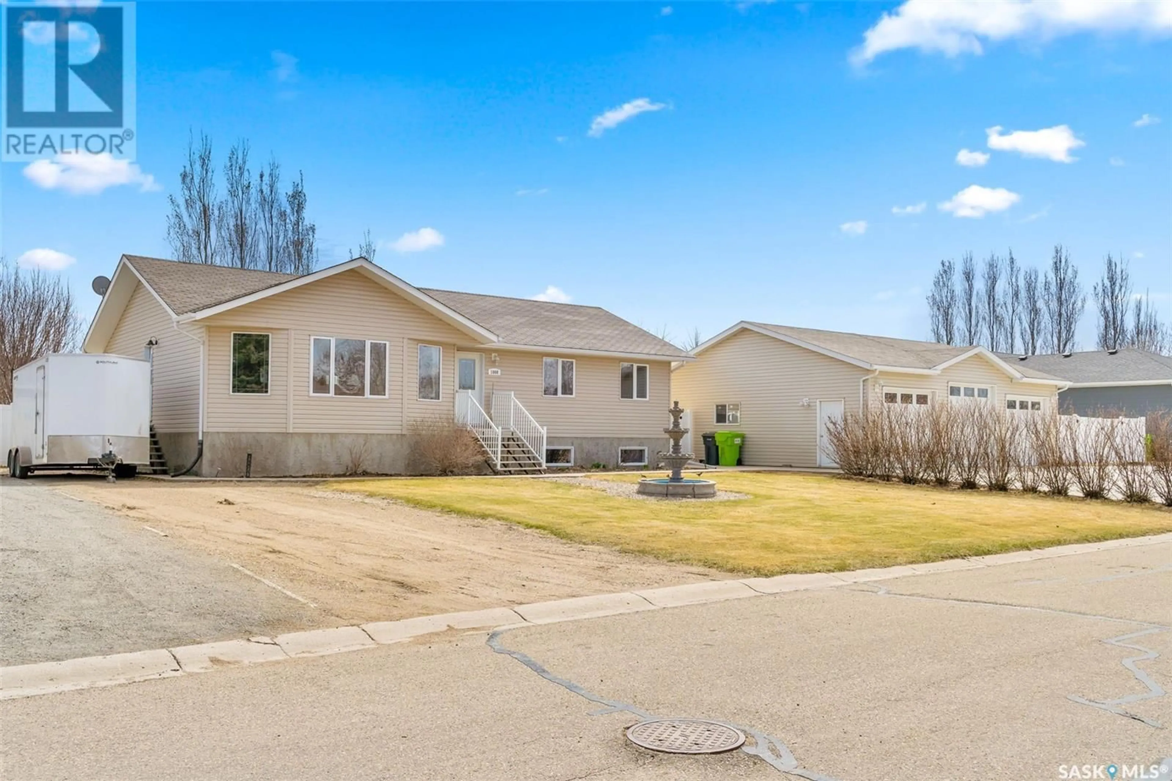 Home with vinyl exterior material, street for 1008 DEWDNEY STREET, Indian Head Saskatchewan S0G2K0