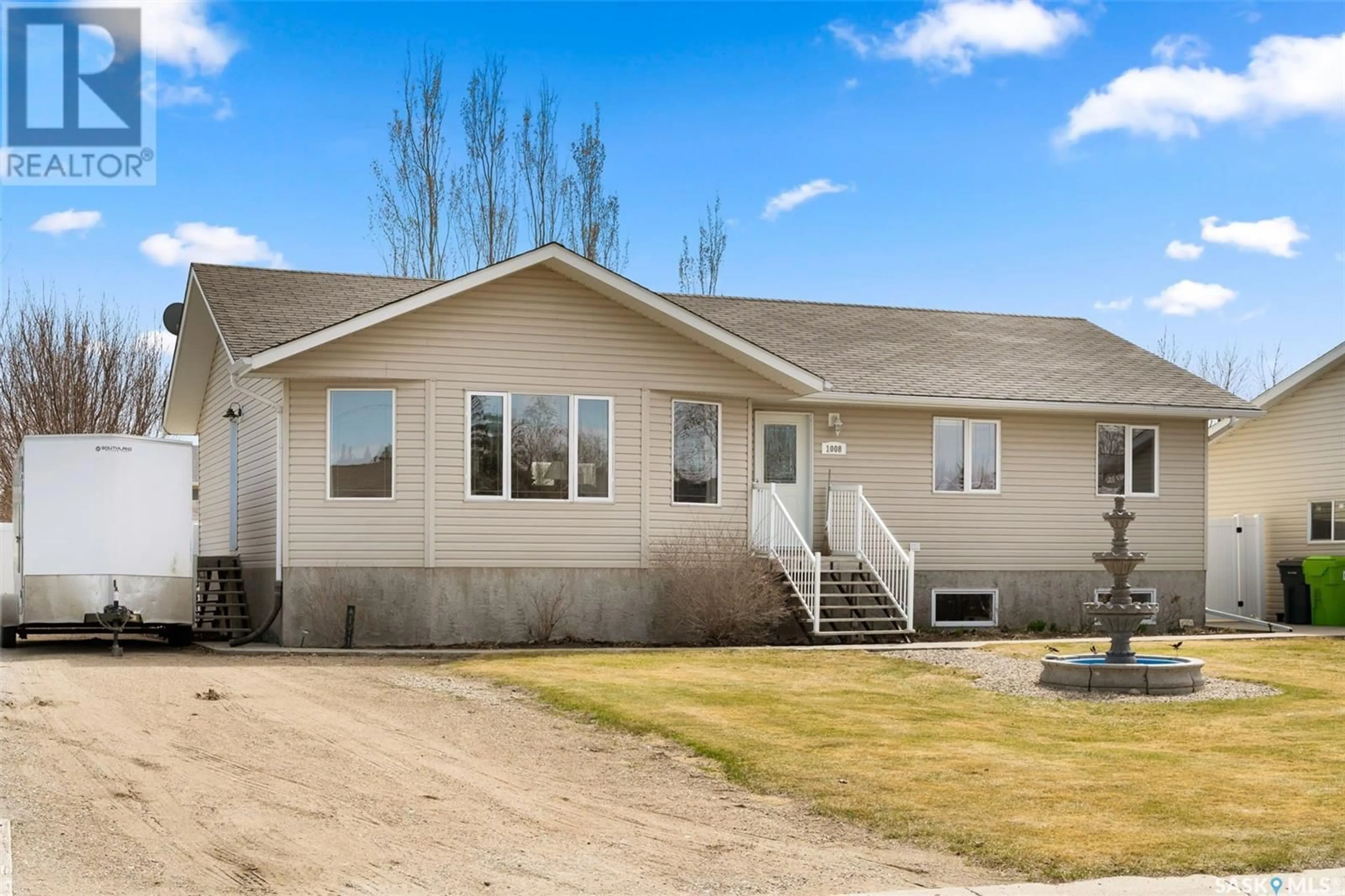 Home with vinyl exterior material, street for 1008 DEWDNEY STREET, Indian Head Saskatchewan S0G2K0