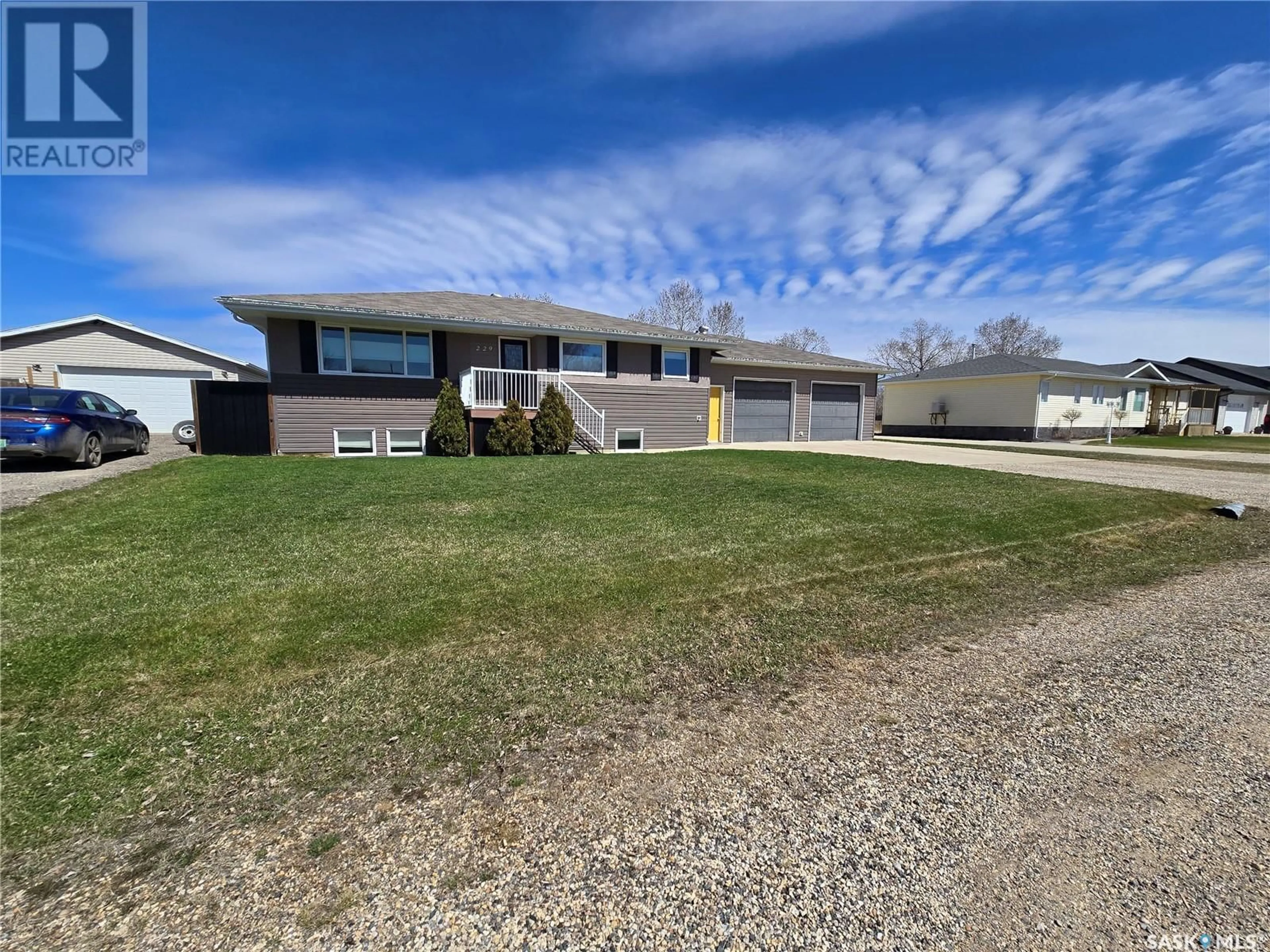 A pic from outside/outdoor area/front of a property/back of a property/a pic from drone, unknown for 229 3RD STREET, North Weyburn Saskatchewan S0C1X0