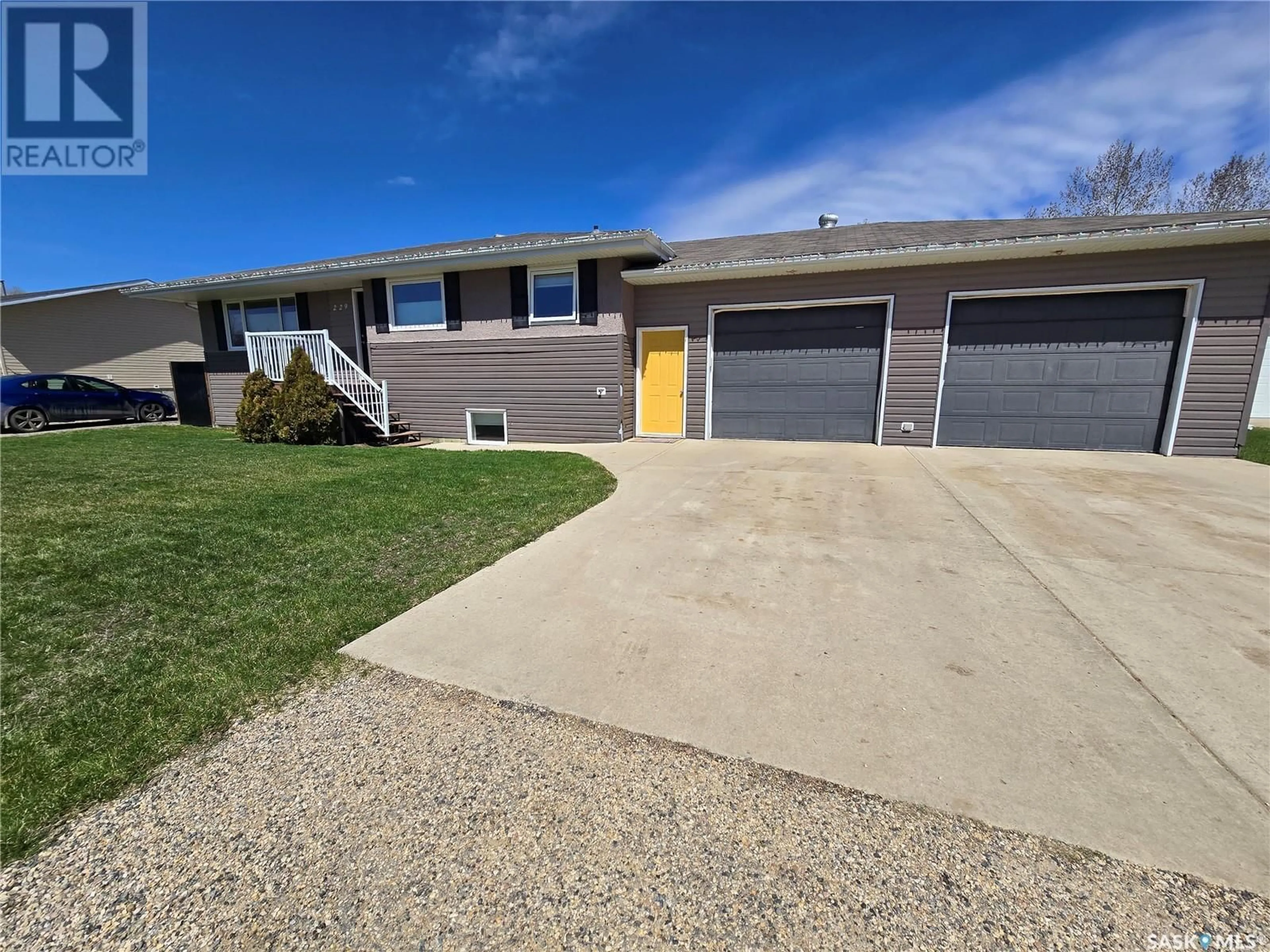 A pic from outside/outdoor area/front of a property/back of a property/a pic from drone, street for 229 3RD STREET, North Weyburn Saskatchewan S0C1X0
