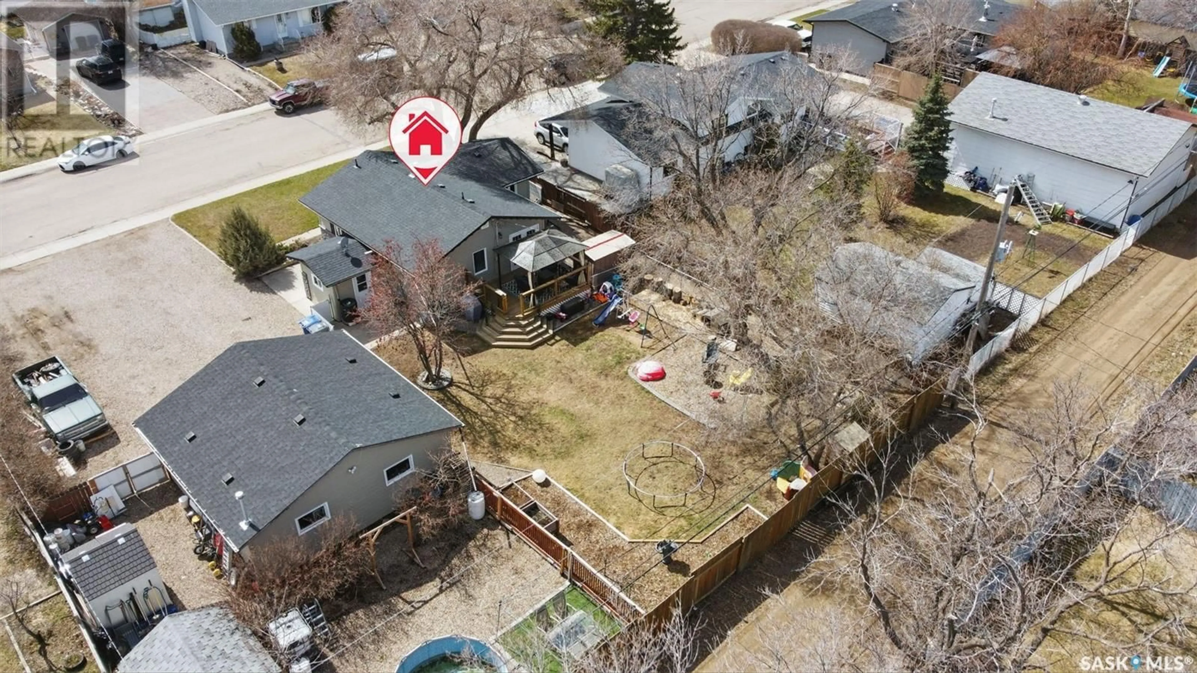 A pic from outside/outdoor area/front of a property/back of a property/a pic from drone, street for 313 3RD STREET, Martensville Saskatchewan S0K0A2