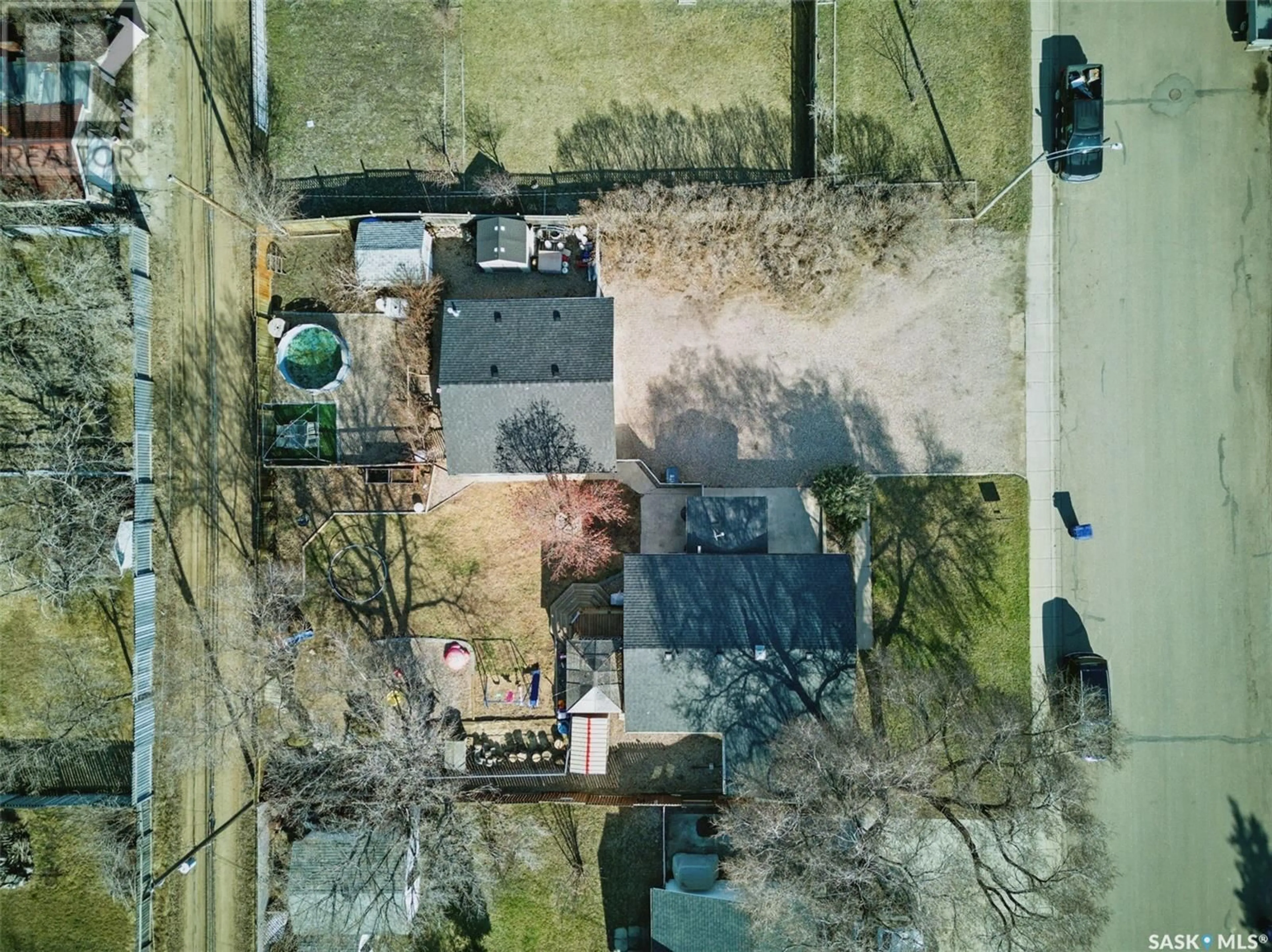 A pic from outside/outdoor area/front of a property/back of a property/a pic from drone, street for 313 3RD STREET, Martensville Saskatchewan S0K0A2
