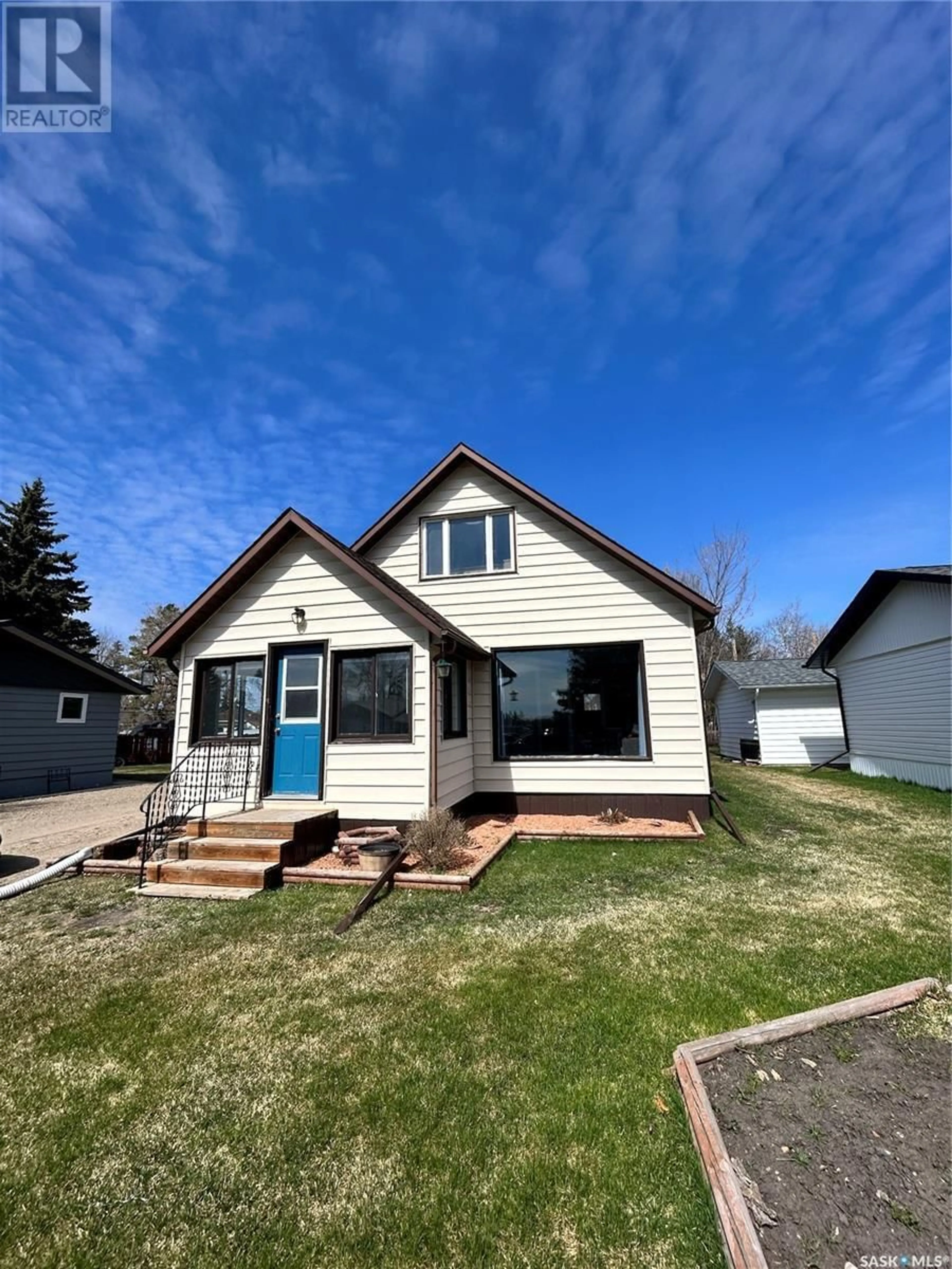 Home with vinyl exterior material, street for 128 TANNER AVENUE, Churchbridge Saskatchewan S0A0M0