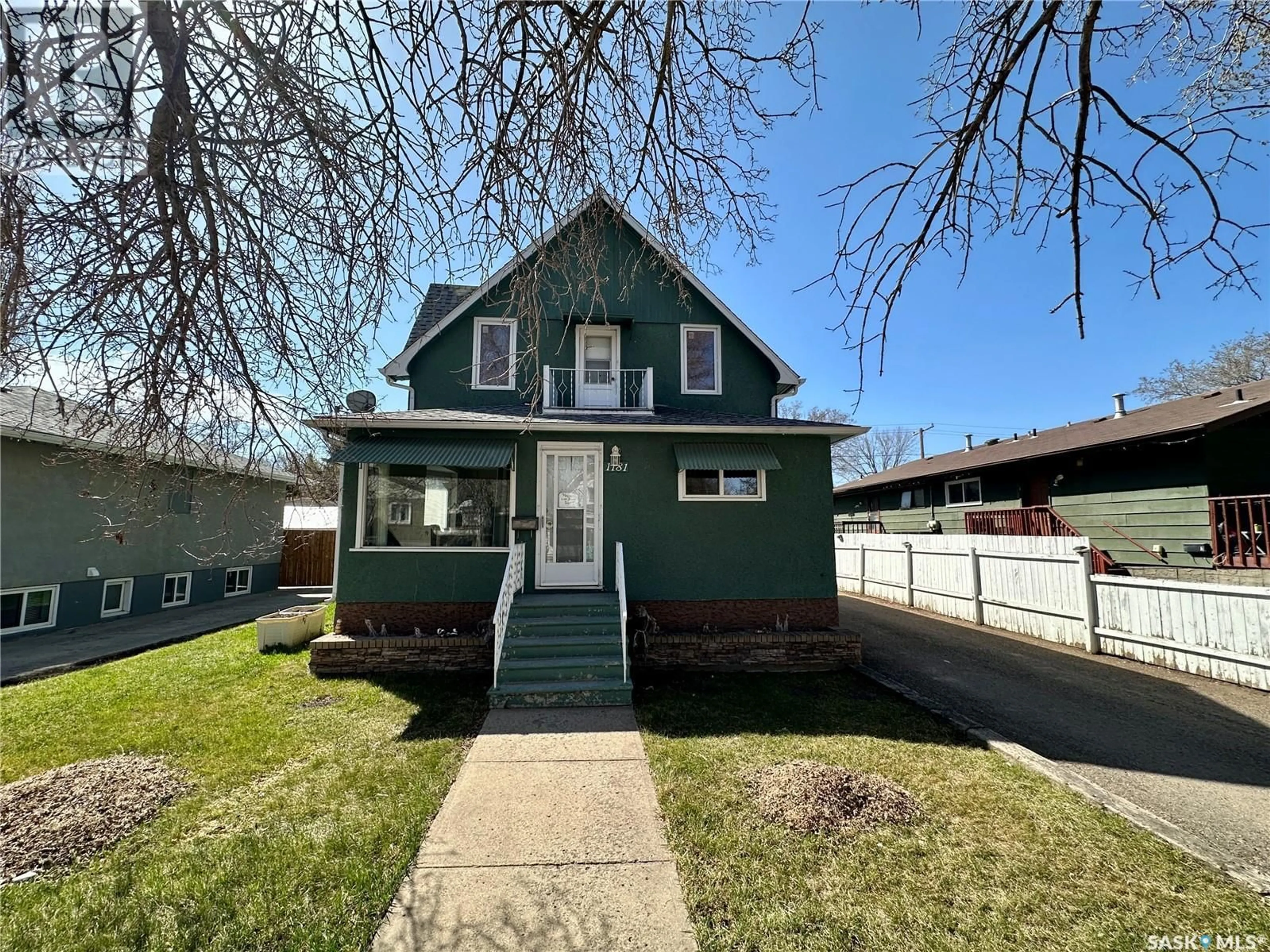 Home with vinyl exterior material, street for 1181 107TH STREET, North Battleford Saskatchewan S9A1Z2