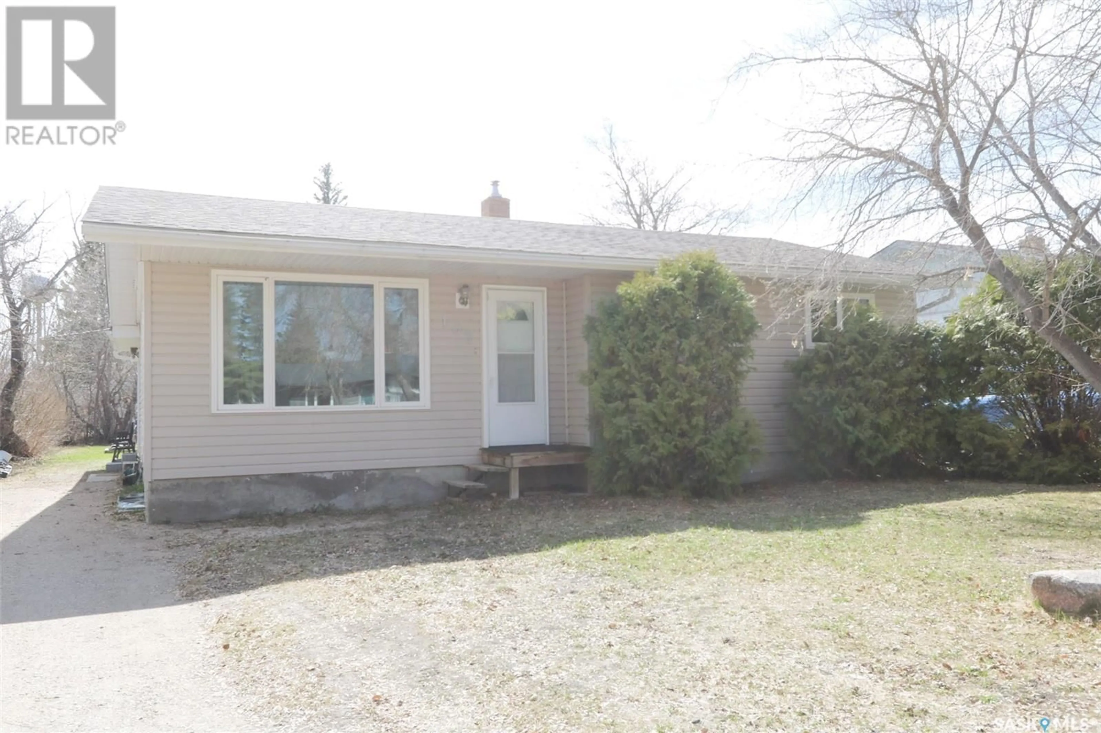 Home with vinyl exterior material, street for 107 THIRD STREET, Ituna Saskatchewan S0A1N0