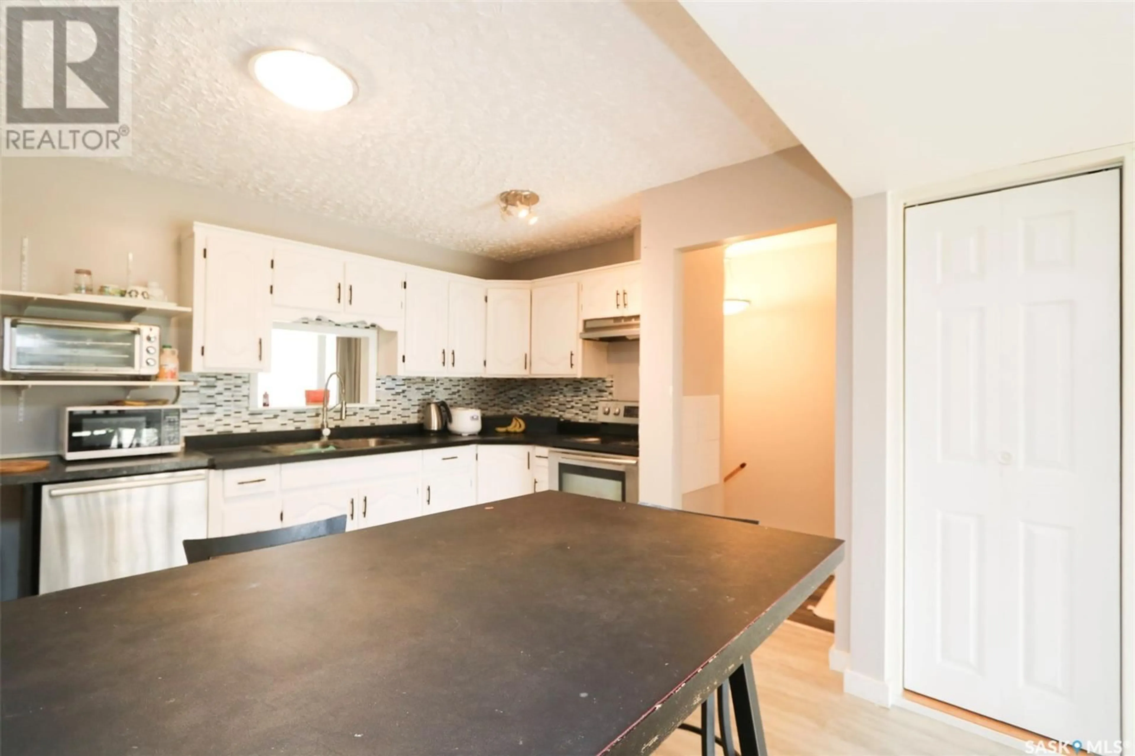 Open concept kitchen, unknown for 107 THIRD STREET, Ituna Saskatchewan S0A1N0