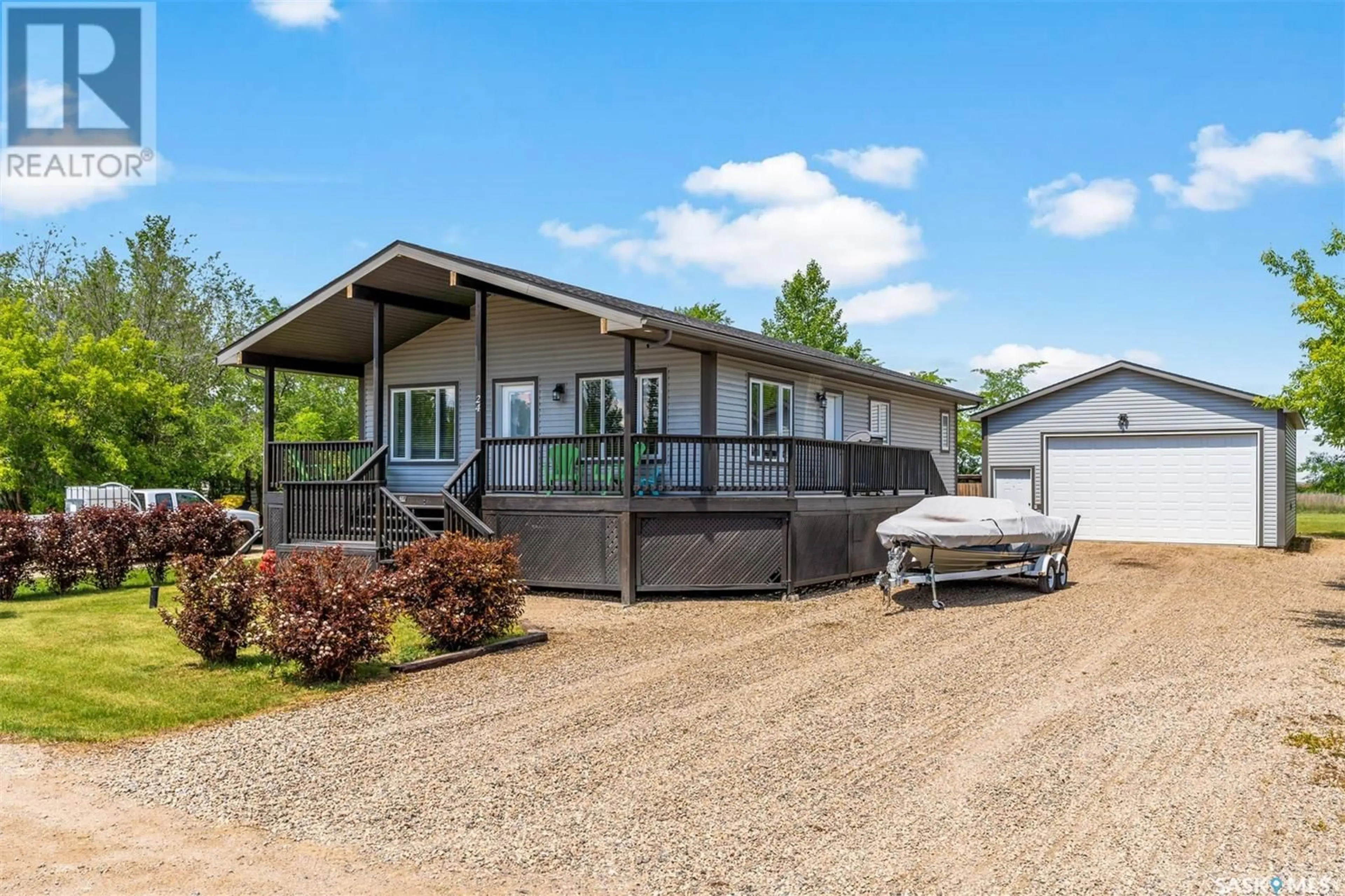 Home with vinyl exterior material, street for 24 KINGBIRD DRIVE, Glen Harbour Saskatchewan S0G4C0