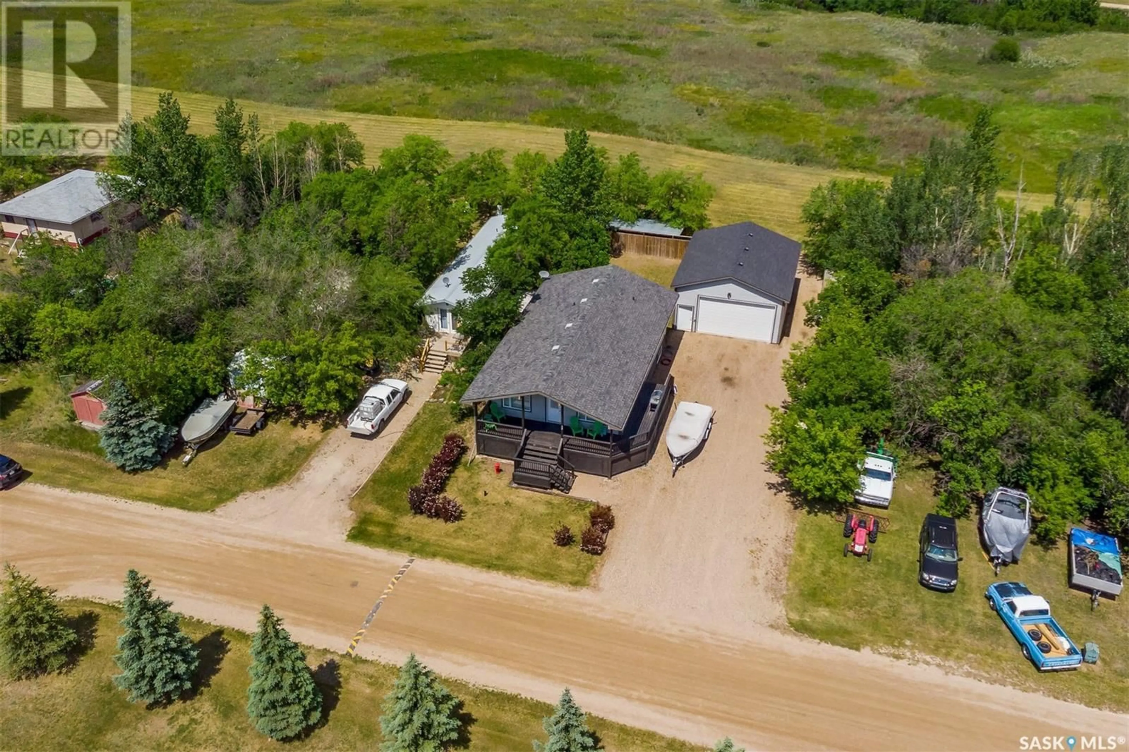 A pic from outside/outdoor area/front of a property/back of a property/a pic from drone, unknown for 24 KINGBIRD DRIVE, Glen Harbour Saskatchewan S0G4C0