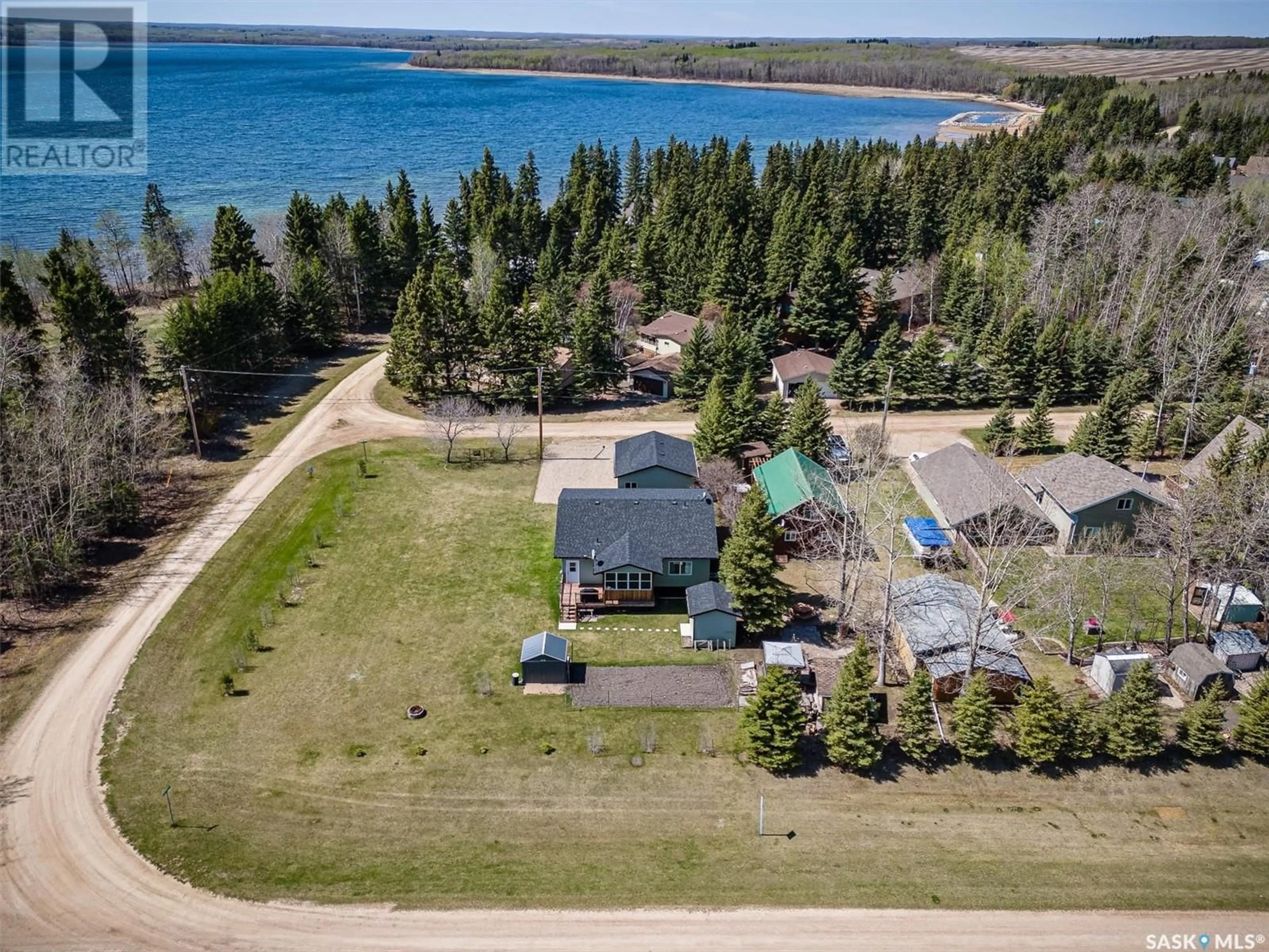 A pic from outside/outdoor area/front of a property/back of a property/a pic from drone, water/lake/river/ocean view for 335 VENTURE ROAD, Pebble Baye Saskatchewan S0J2G0