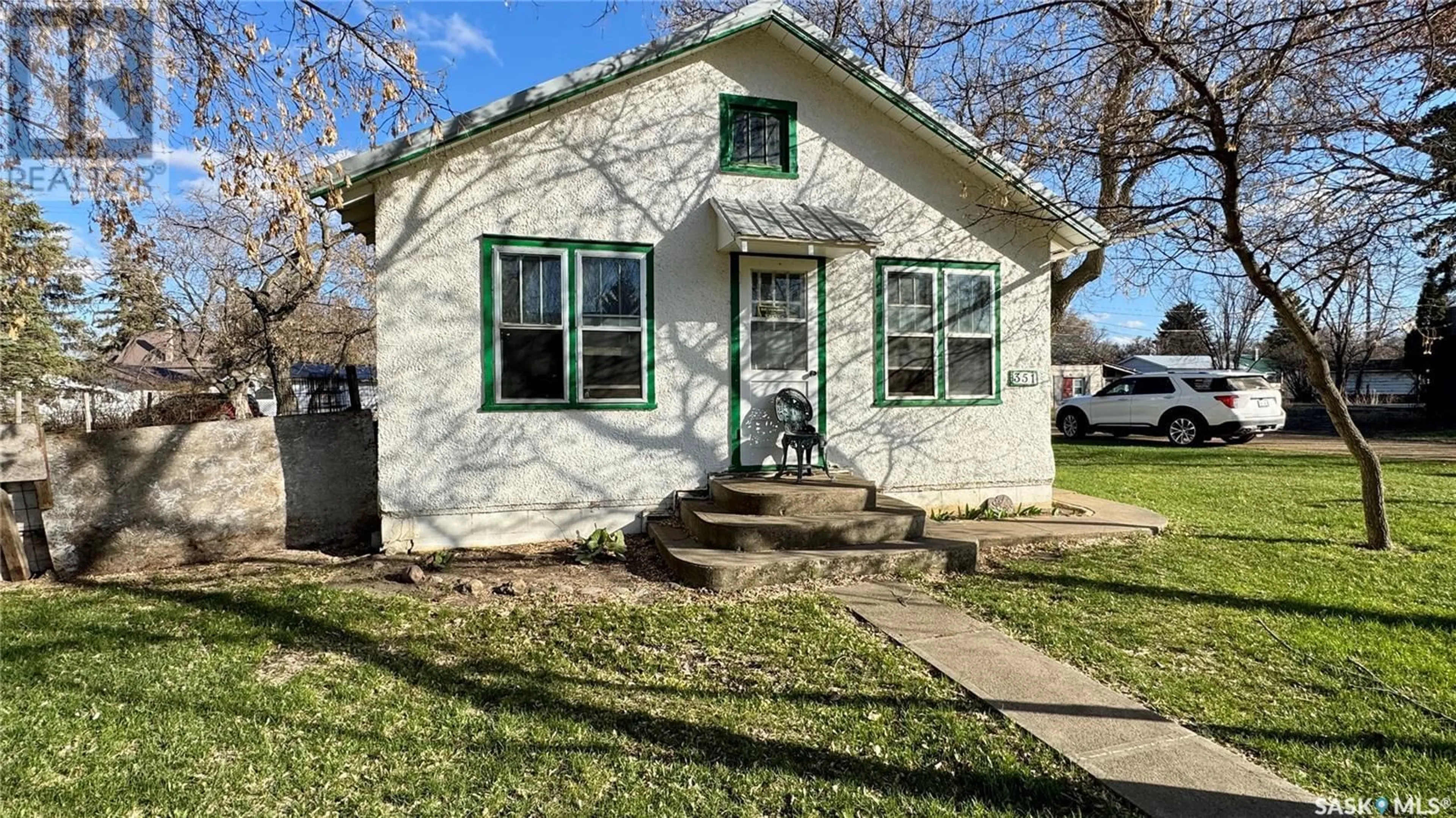 Home with vinyl exterior material, street for 351 4TH STREET, Craik Saskatchewan S0G0V0