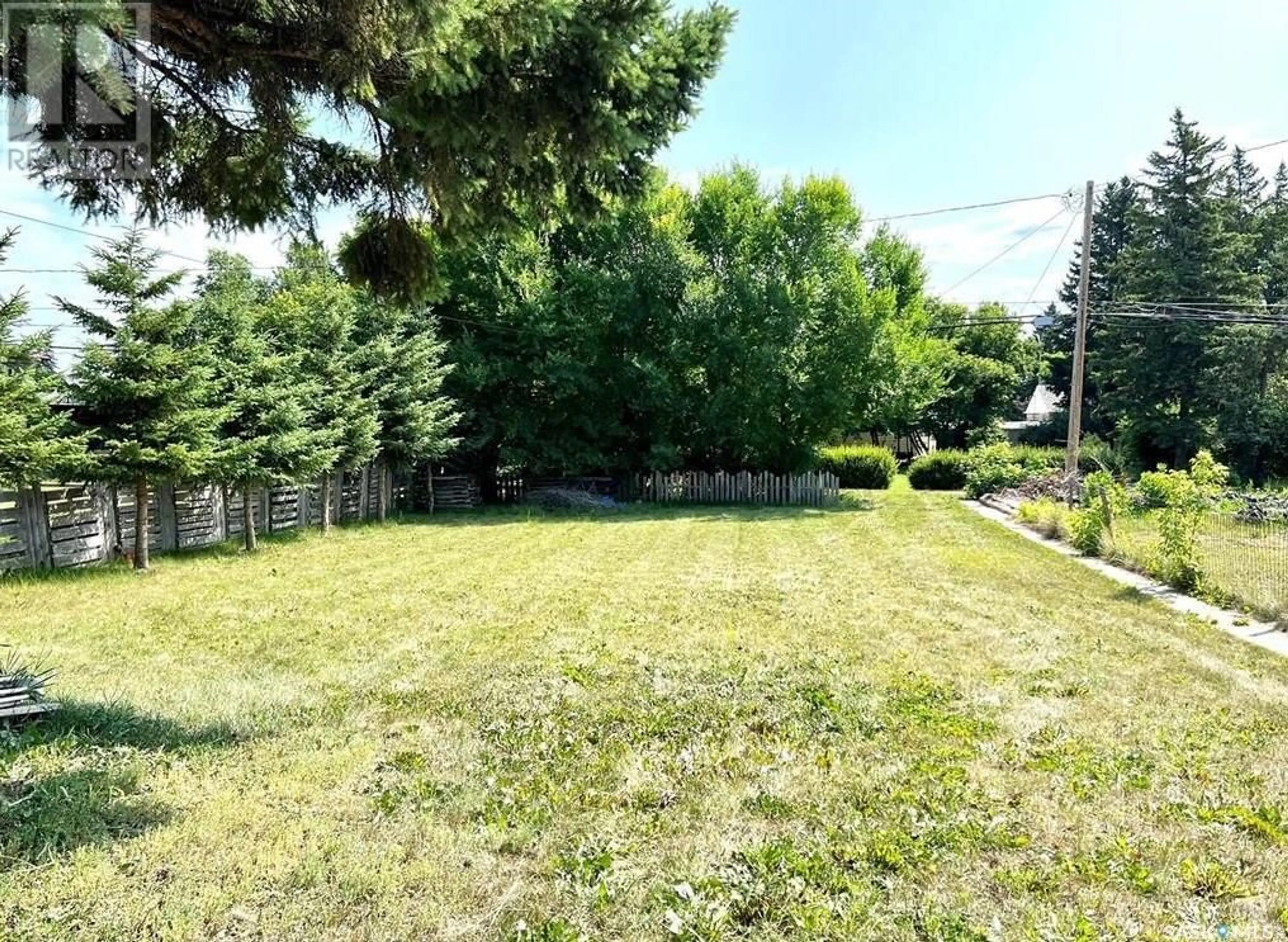 A pic from outside/outdoor area/front of a property/back of a property/a pic from drone, forest/trees view for 35 JAMES AVENUE, Yorkton Saskatchewan S3N2C1