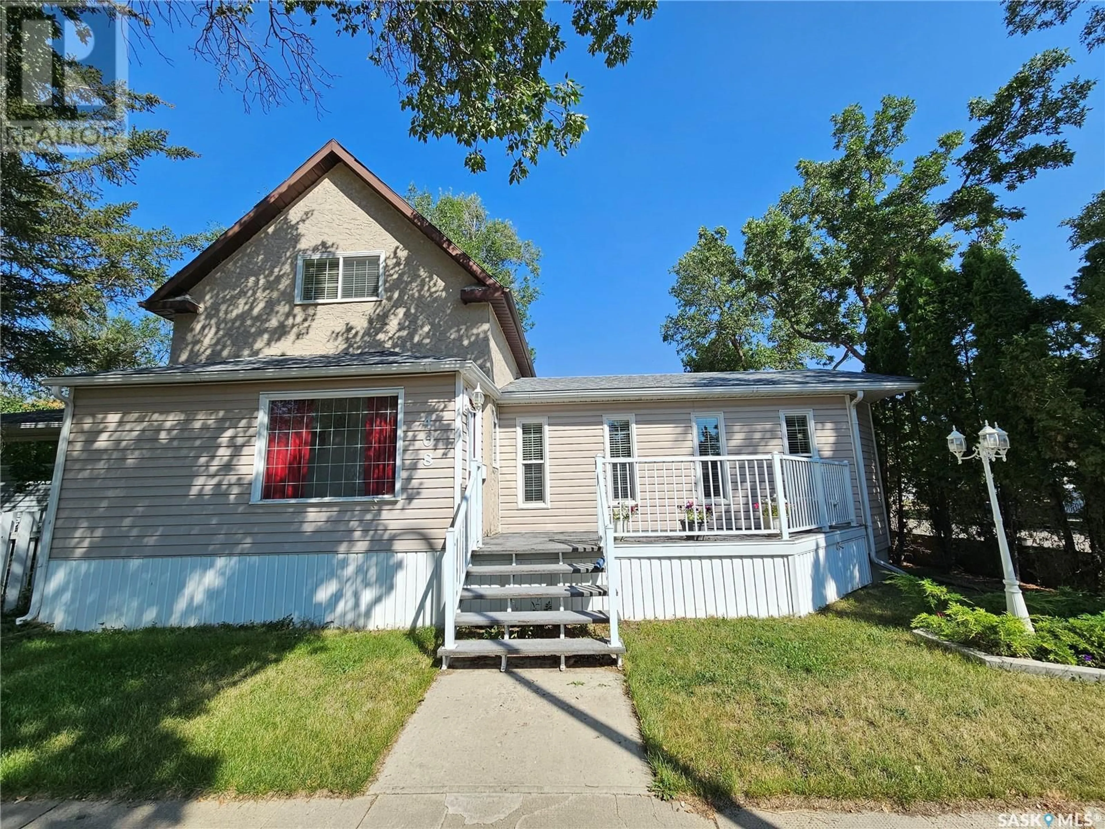 Home with vinyl exterior material, street for 408 DUFFIELD STREET, Moose Jaw Saskatchewan S6H5H8