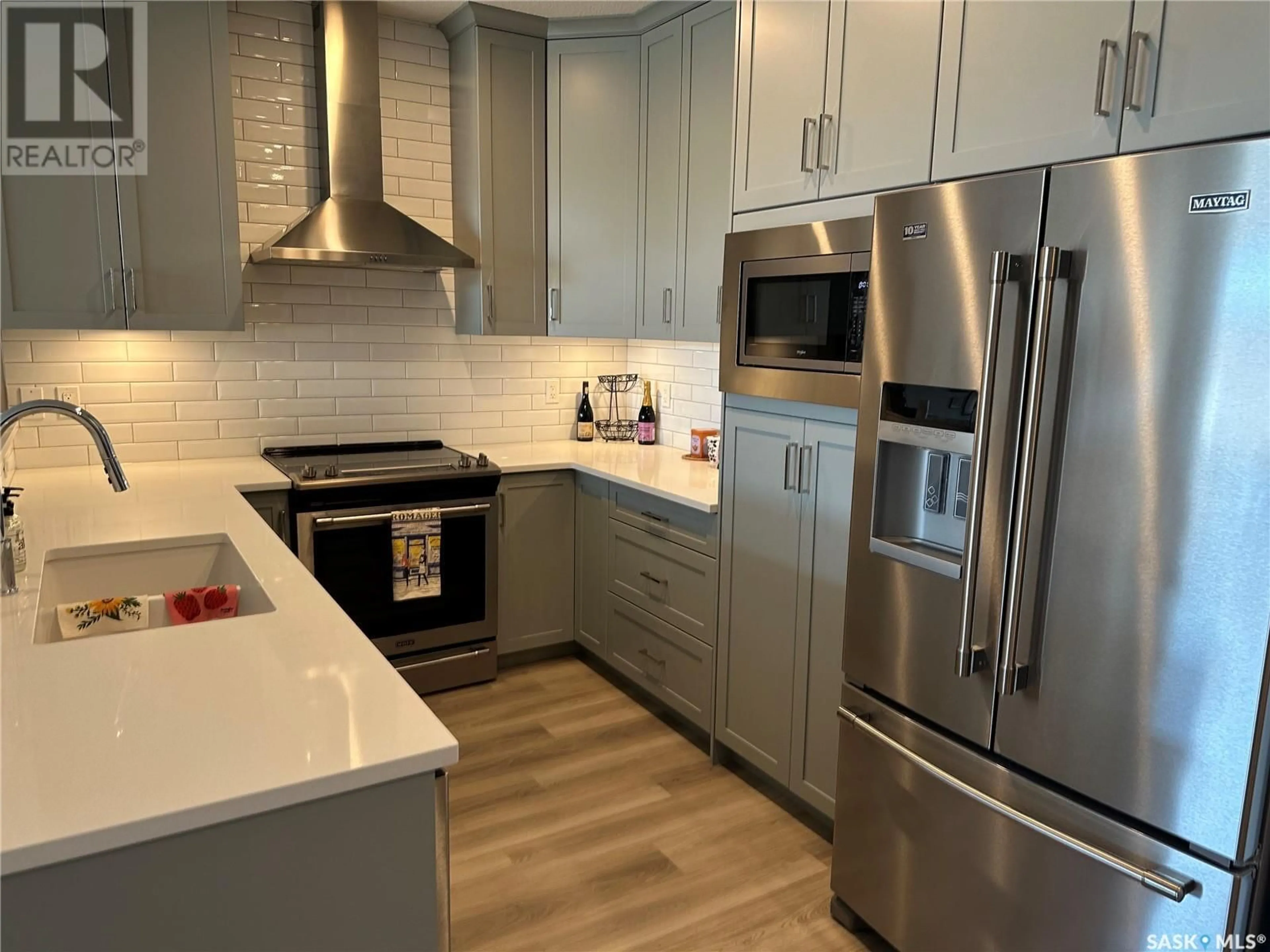 Open concept kitchen, ceramic/tile floor for 204 - 3581 EVANS COURT, Regina Saskatchewan S4S7A3