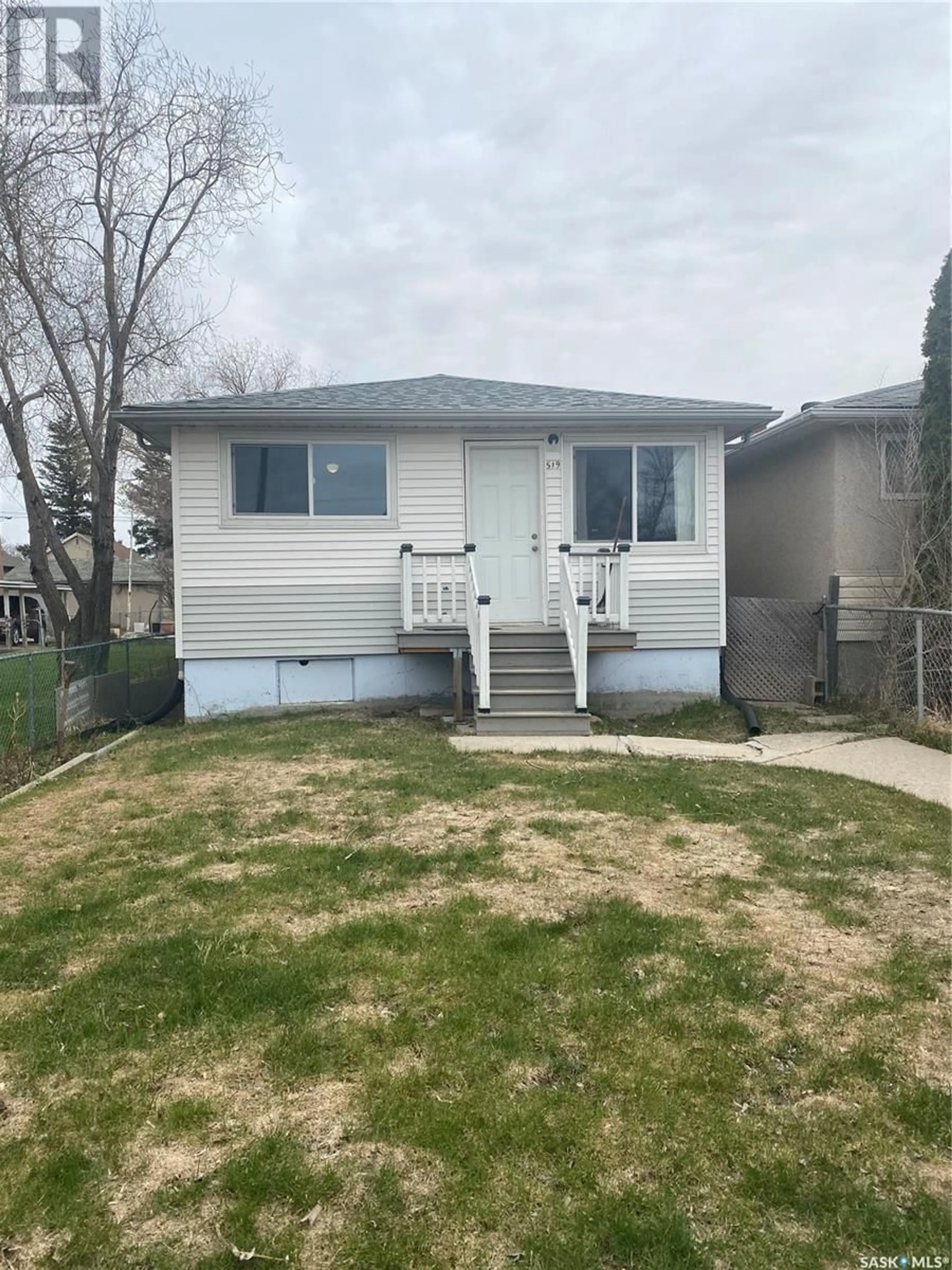 Home with vinyl exterior material, street for 519 HALIFAX STREET, Regina Saskatchewan S4R1T5