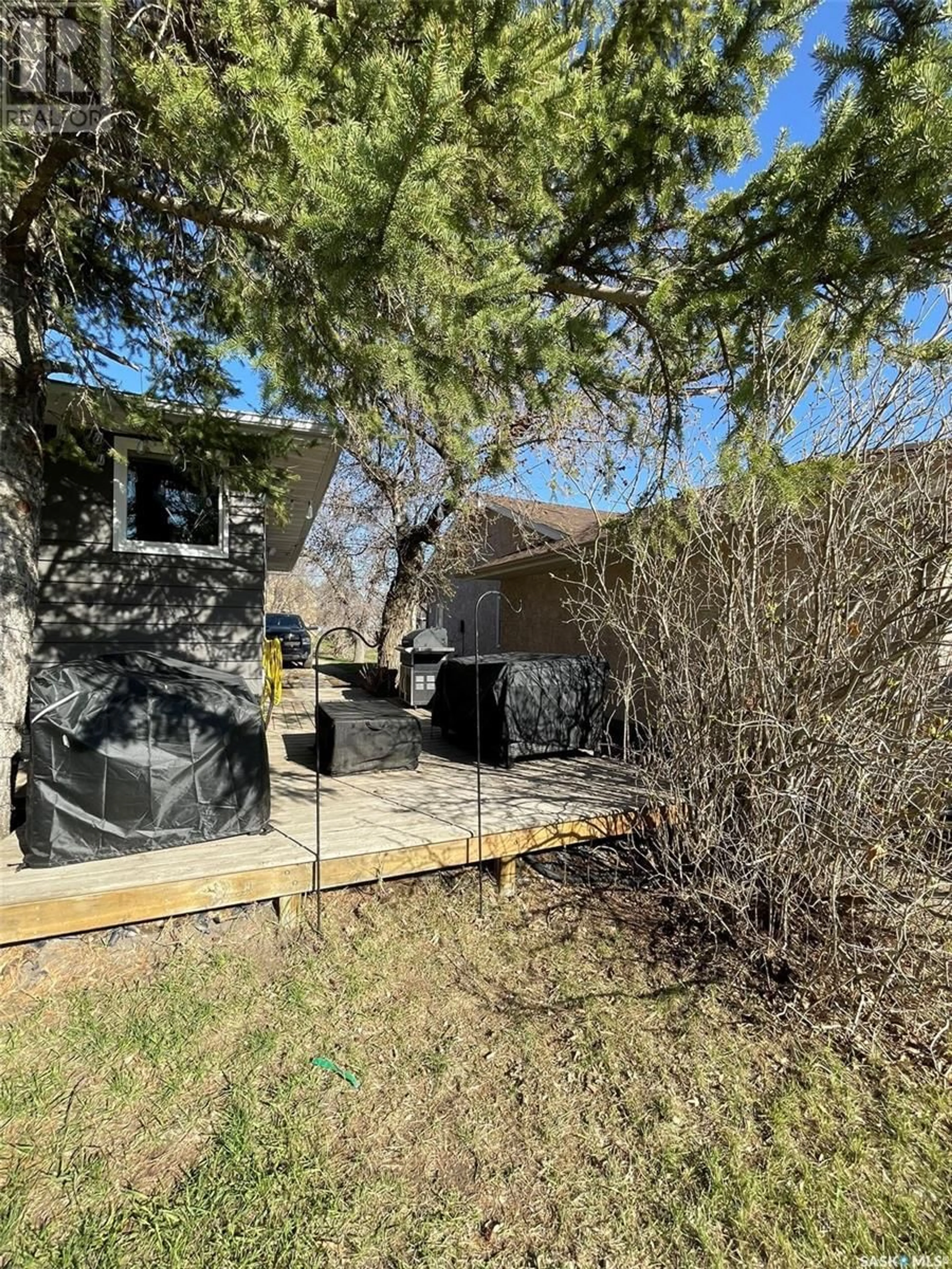 A pic from outside/outdoor area/front of a property/back of a property/a pic from drone, unknown for 209 BROADWAY STREET, Carnduff Saskatchewan S0C0S0
