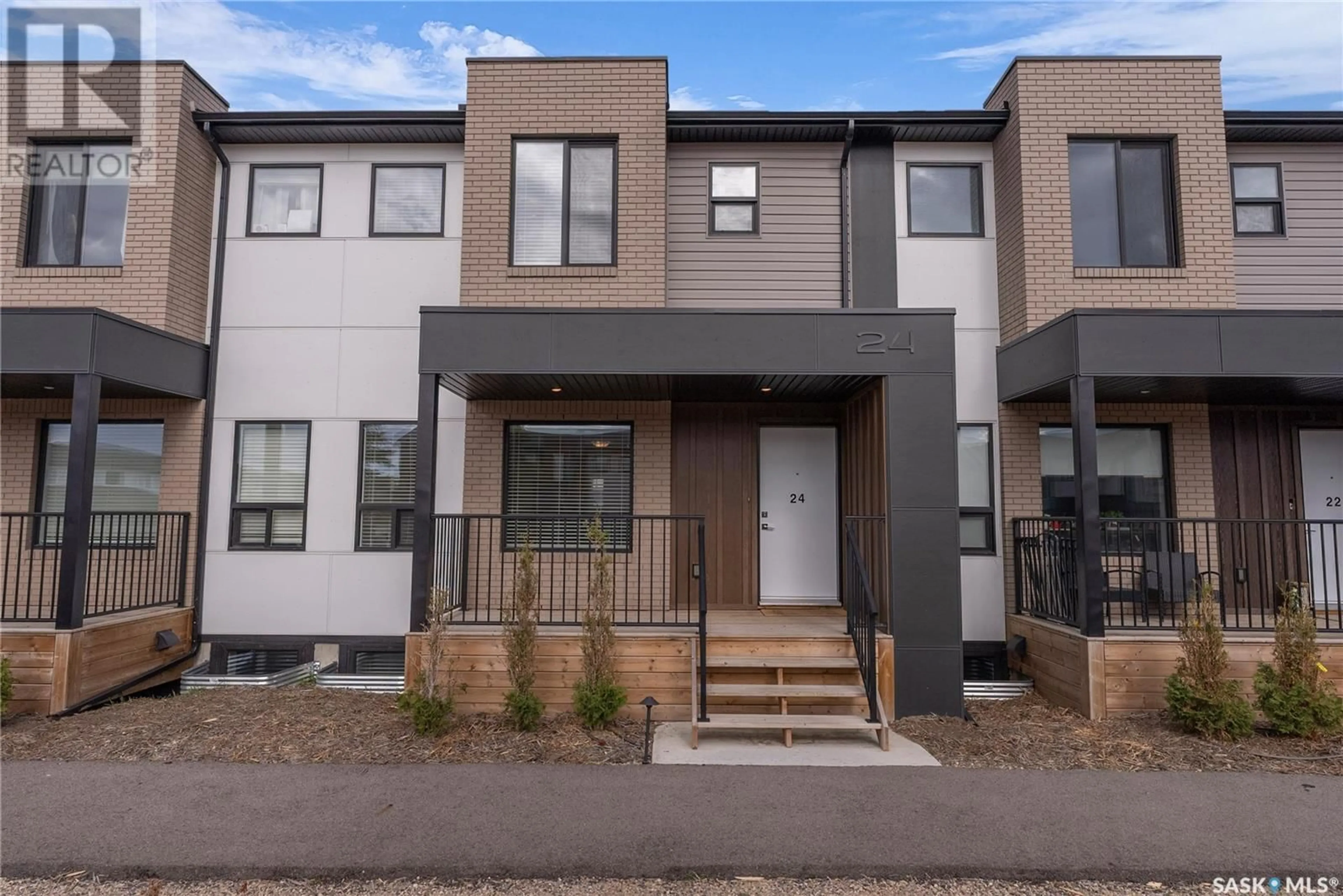 Home with brick exterior material, street for 24 619 EVERGREEN BOULEVARD, Saskatoon Saskatchewan S7W0Y7