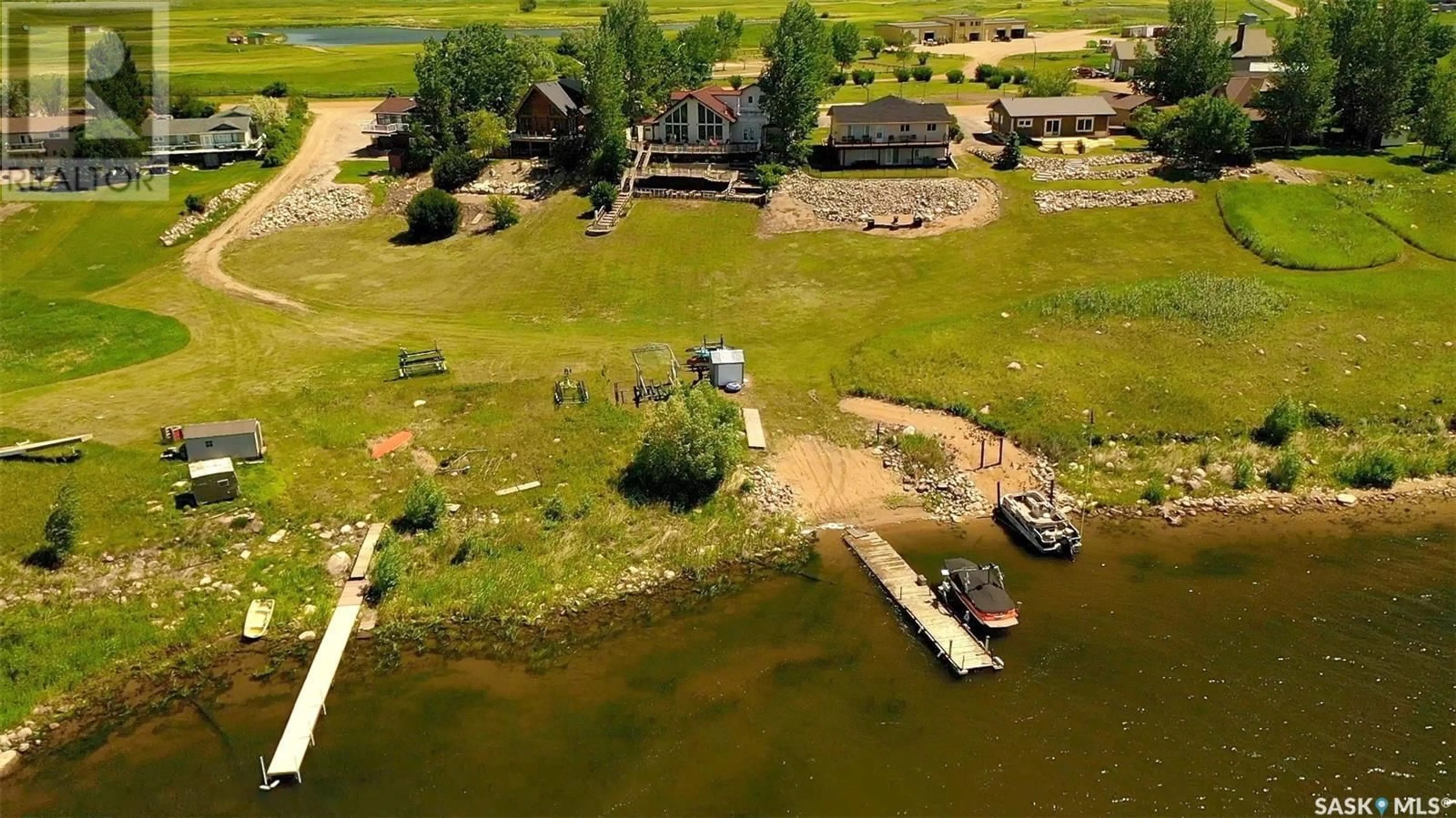 A pic from outside/outdoor area/front of a property/back of a property/a pic from drone, water/lake/river/ocean view for 8 CHANDLER CRESCENT, Cymri Rm No. 36 Saskatchewan S0C1S0