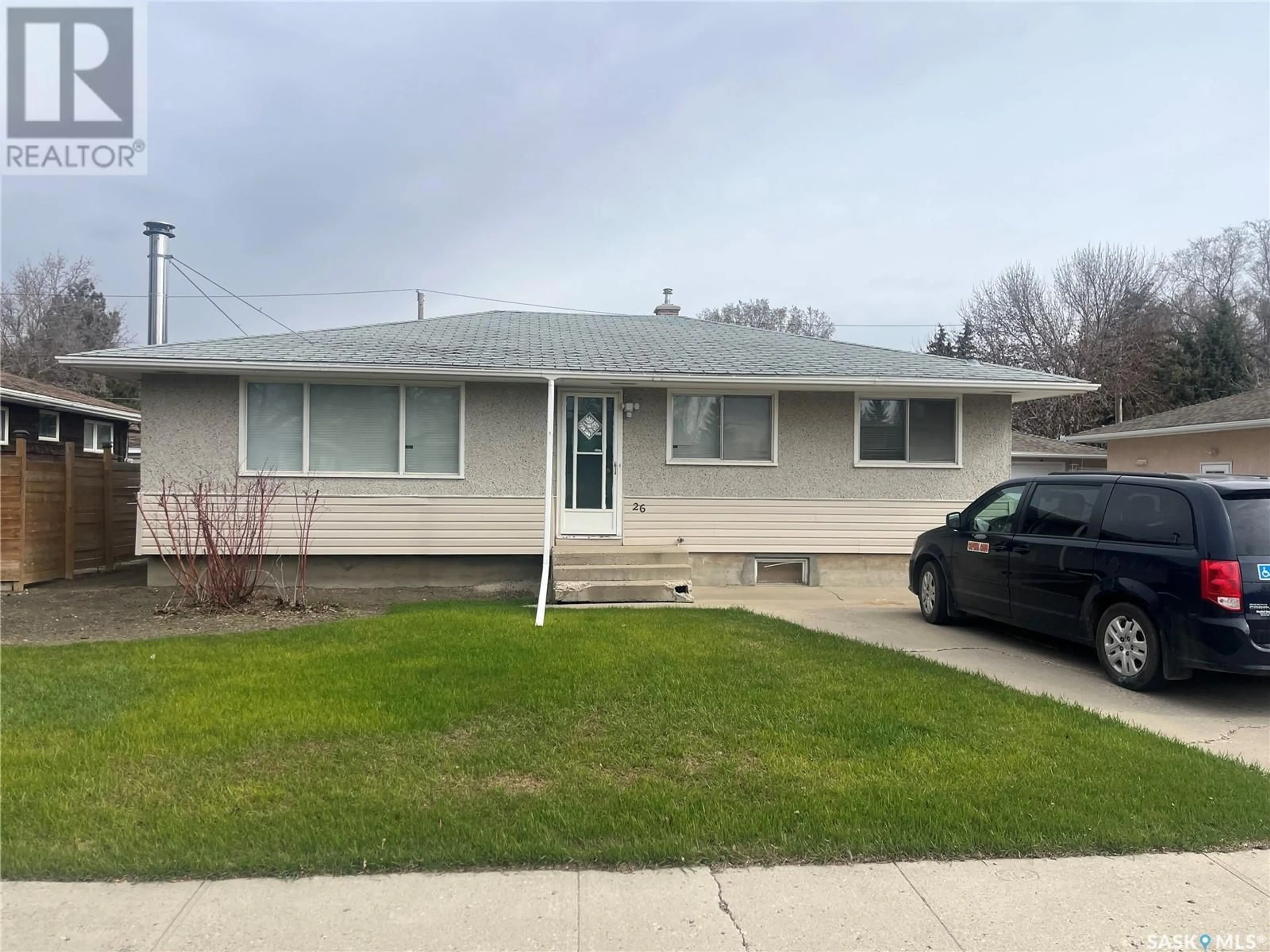 Home with vinyl exterior material, street for 26 HYDE AVENUE, Regina Saskatchewan S4R3X7