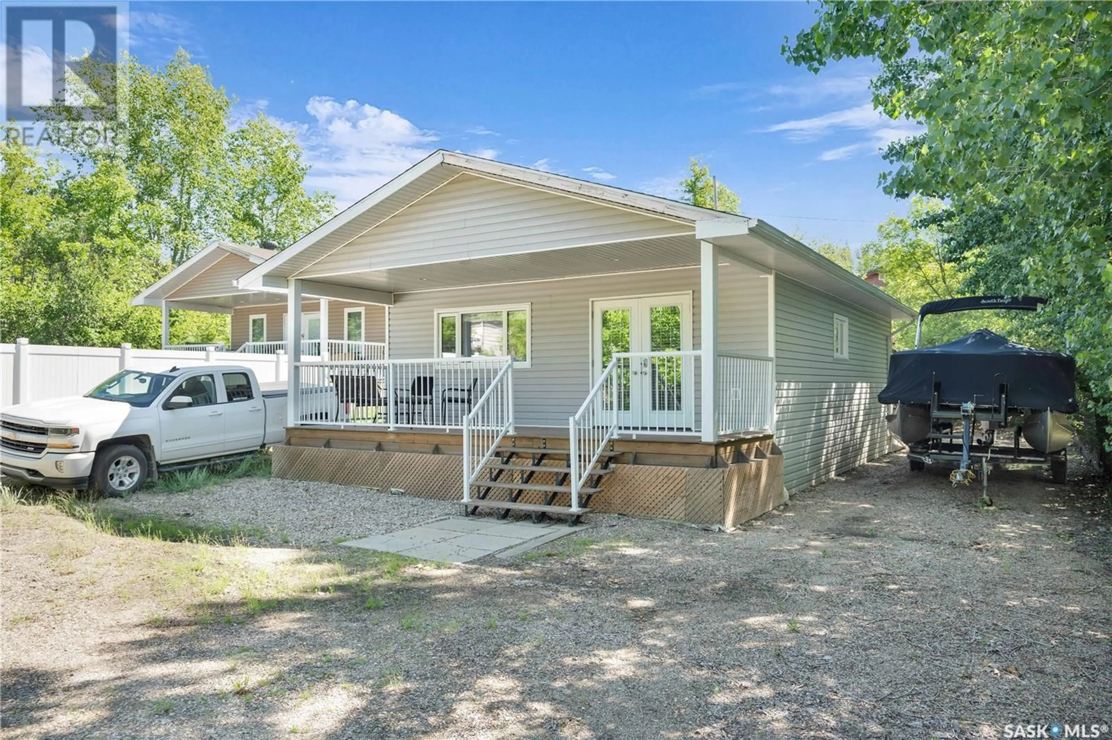 Home with vinyl exterior material, street for 607 BRIGHTON STREET, Saskatchewan Beach Saskatchewan S0G4L0