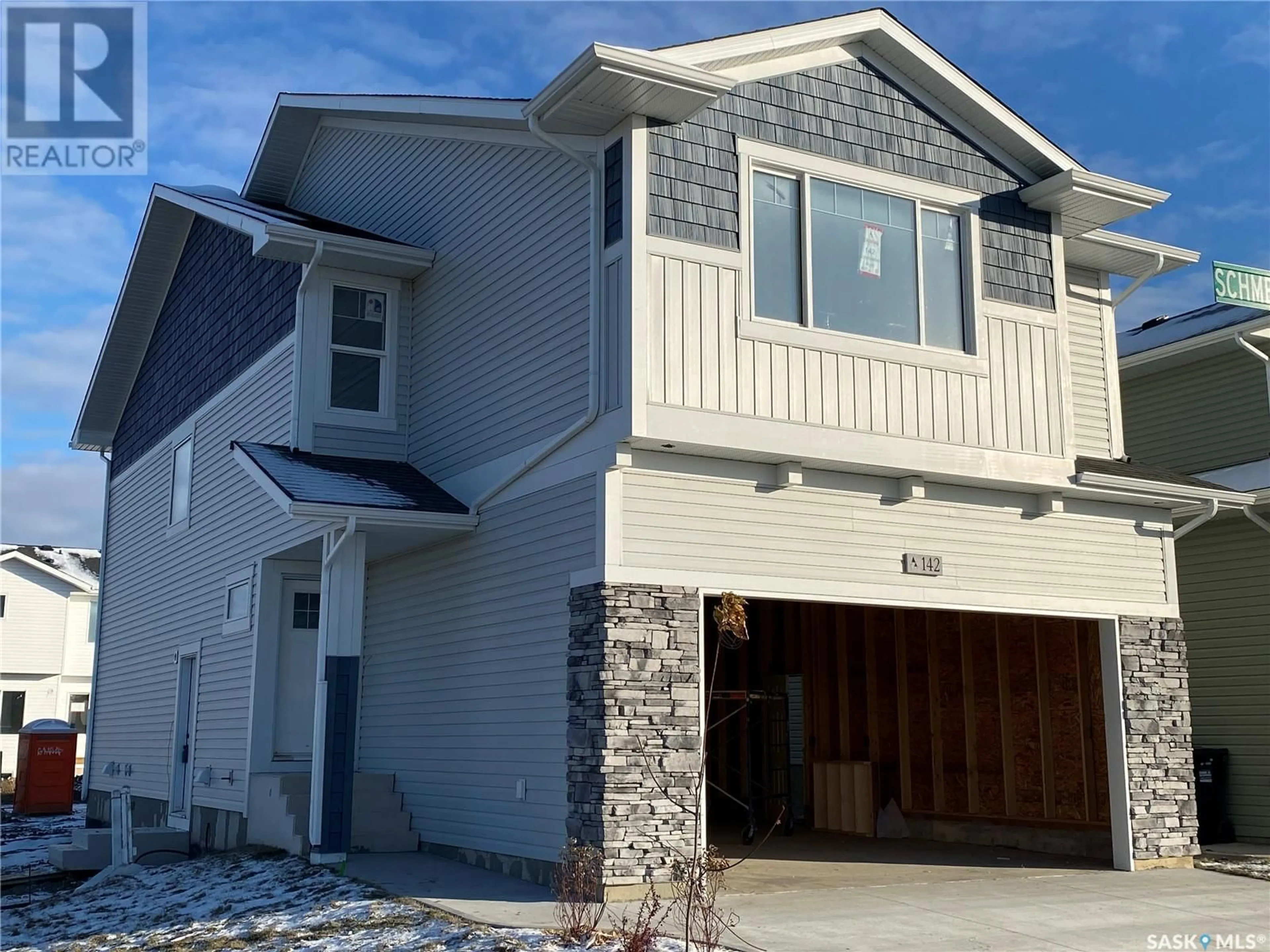 Home with vinyl exterior material, street for 202 ANTONINI COURT, Saskatoon Saskatchewan S7L7P3