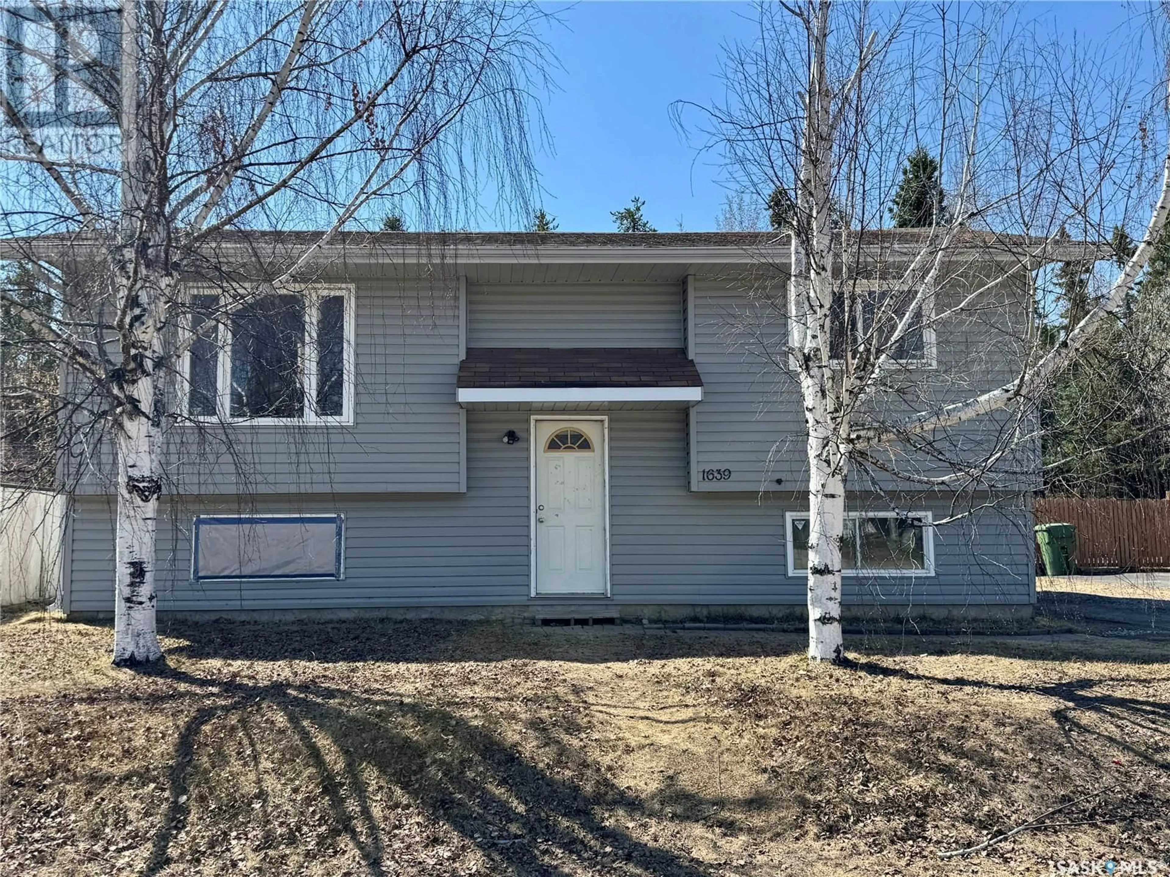 Home with vinyl exterior material, street for 1639 STUDER STREET, La Ronge Saskatchewan S0J1L0
