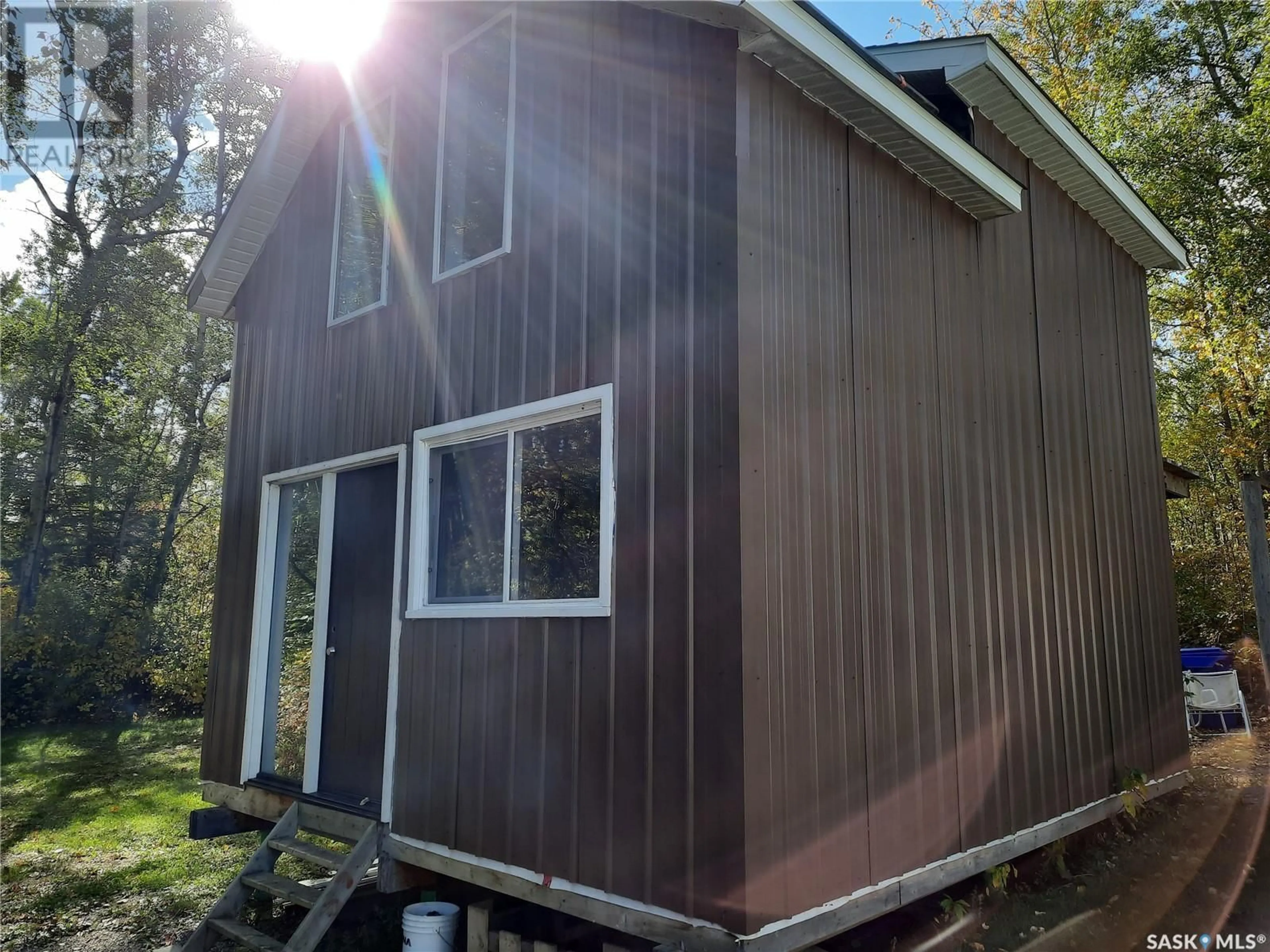 Home with vinyl exterior material, building for 210 MAIN STREET, Christopher Lake Saskatchewan S0J0N0