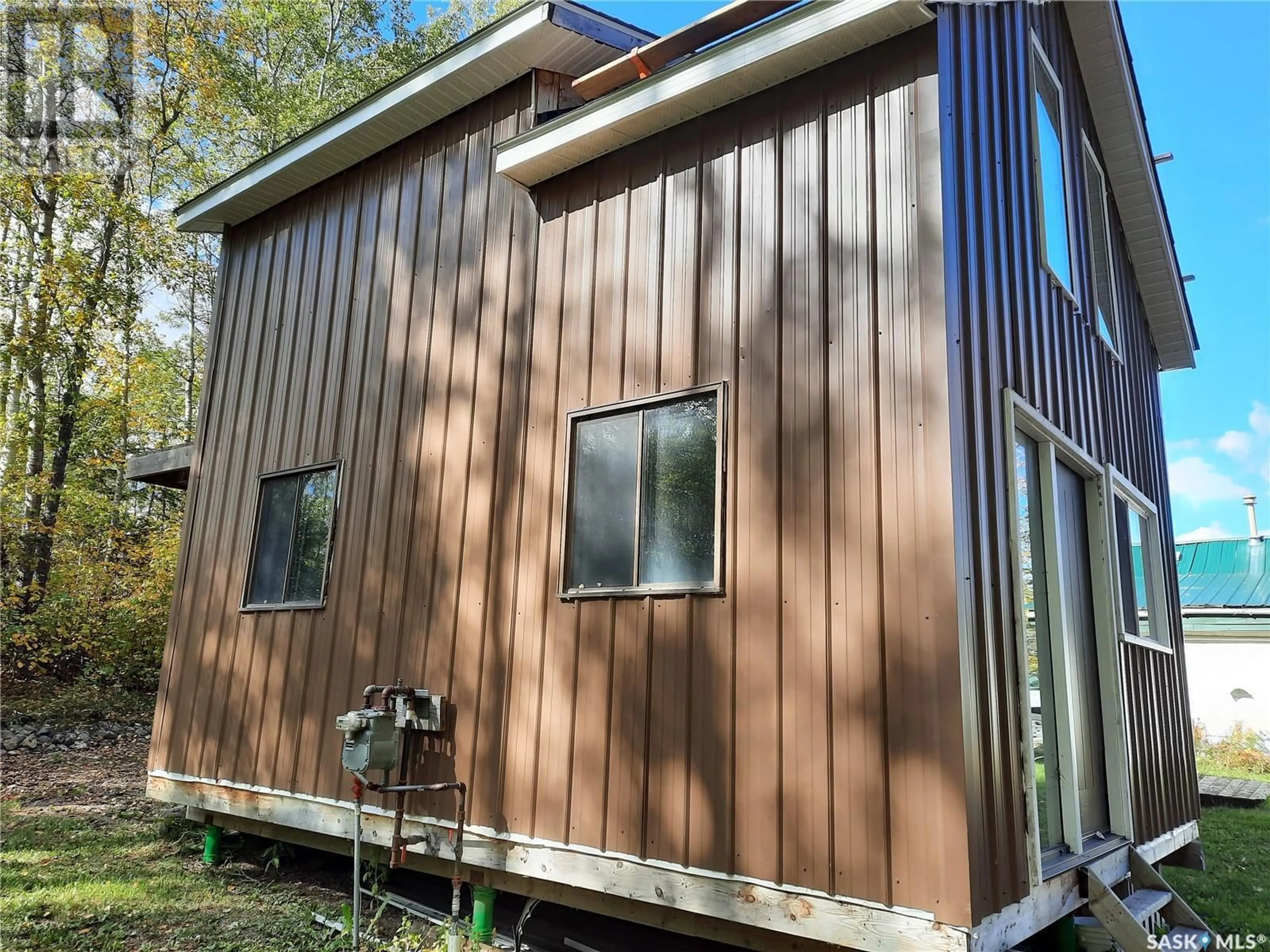 Home with vinyl exterior material, building for 210 MAIN STREET, Christopher Lake Saskatchewan S0J0N0