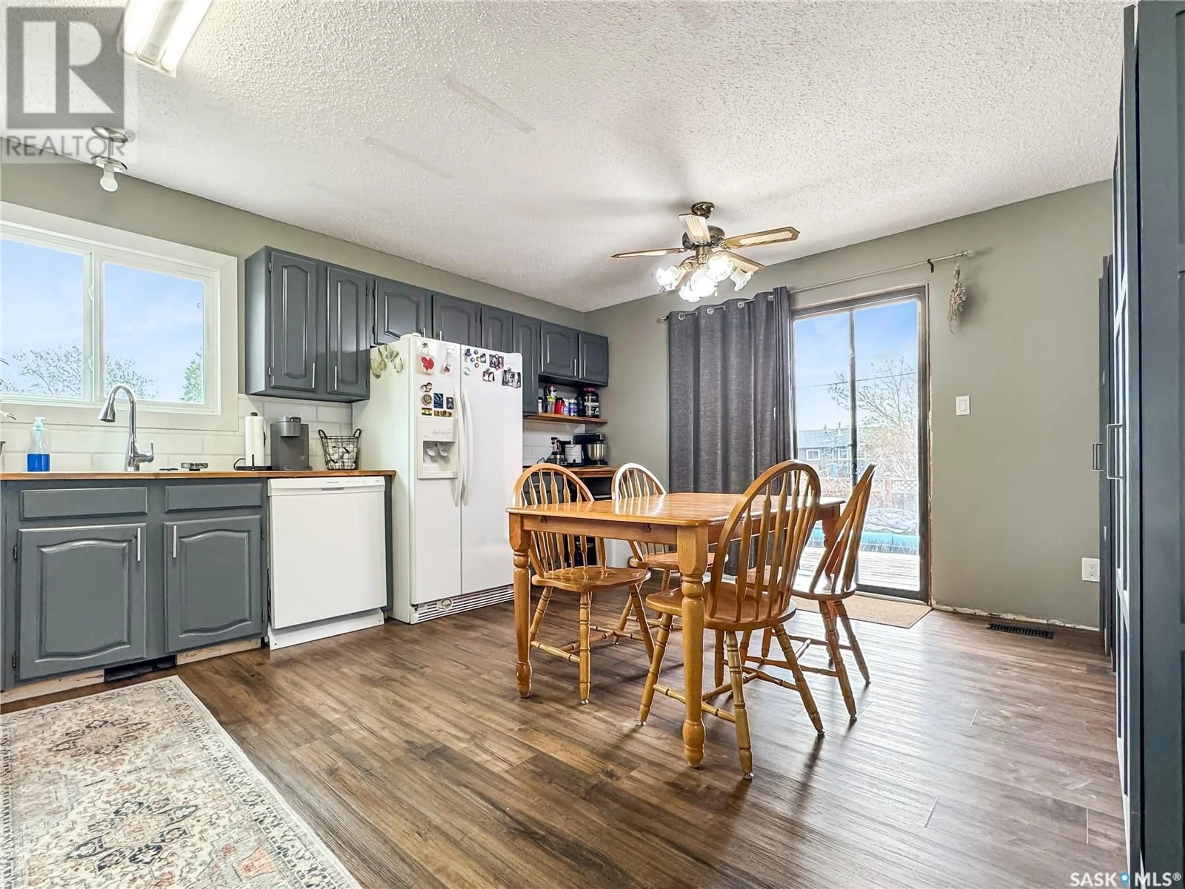 Open concept kitchen, wood/laminate floor for 321 ARTHUR STREET, Cut Knife Saskatchewan S0M0N0