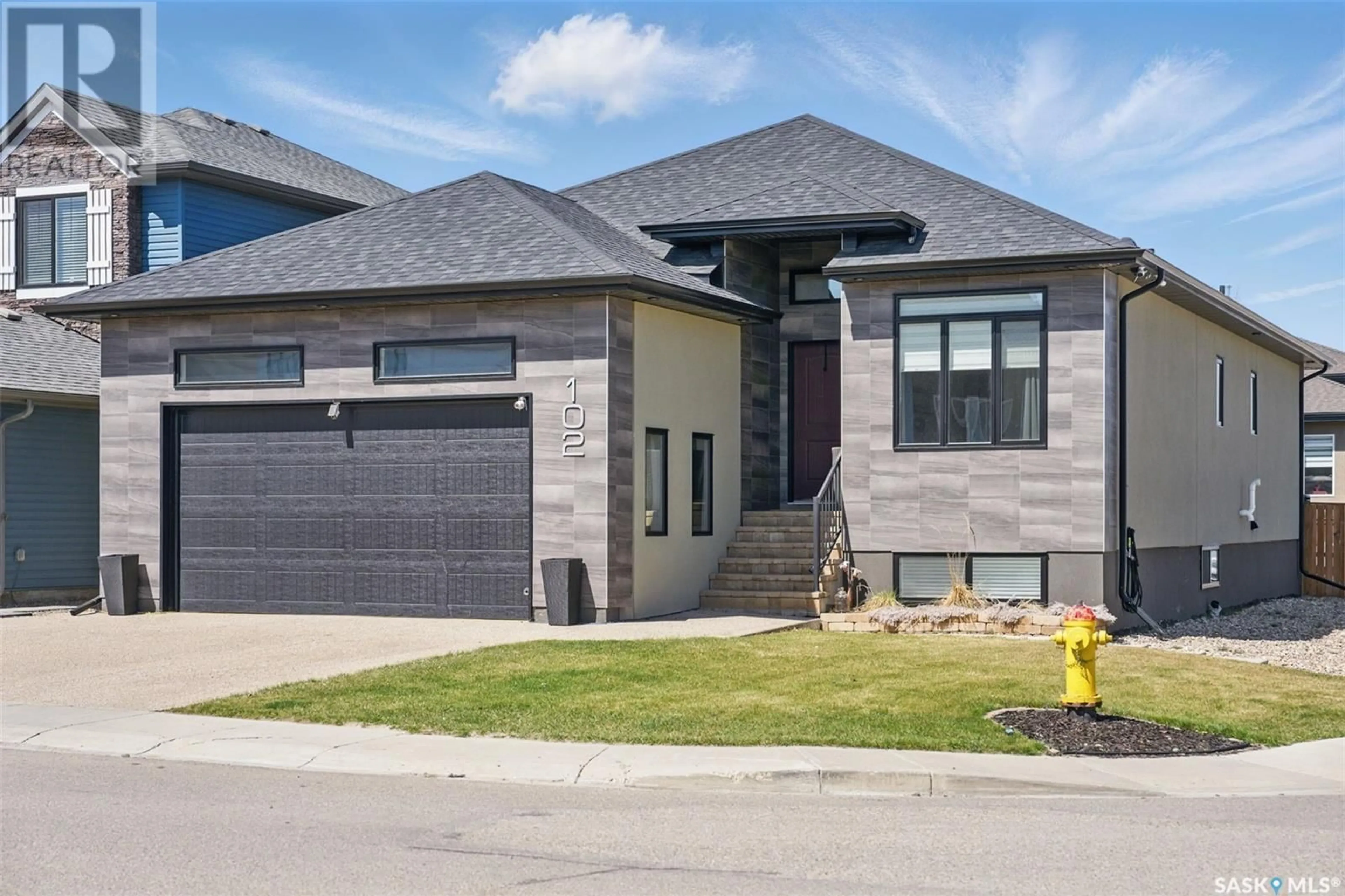 Home with brick exterior material, street for 102 BURGESS CRESCENT, Saskatoon Saskatchewan S7V0S1