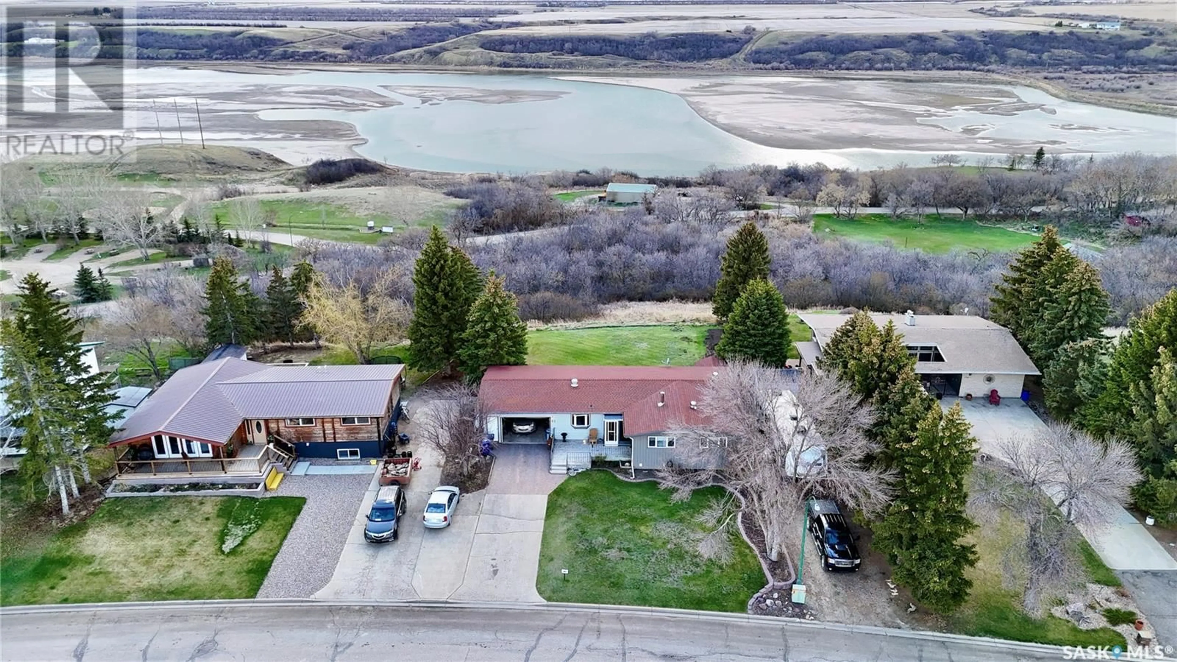 A pic from outside/outdoor area/front of a property/back of a property/a pic from drone, water/lake/river/ocean view for 45 TUFTS CRESCENT, Outlook Saskatchewan S0L2N0