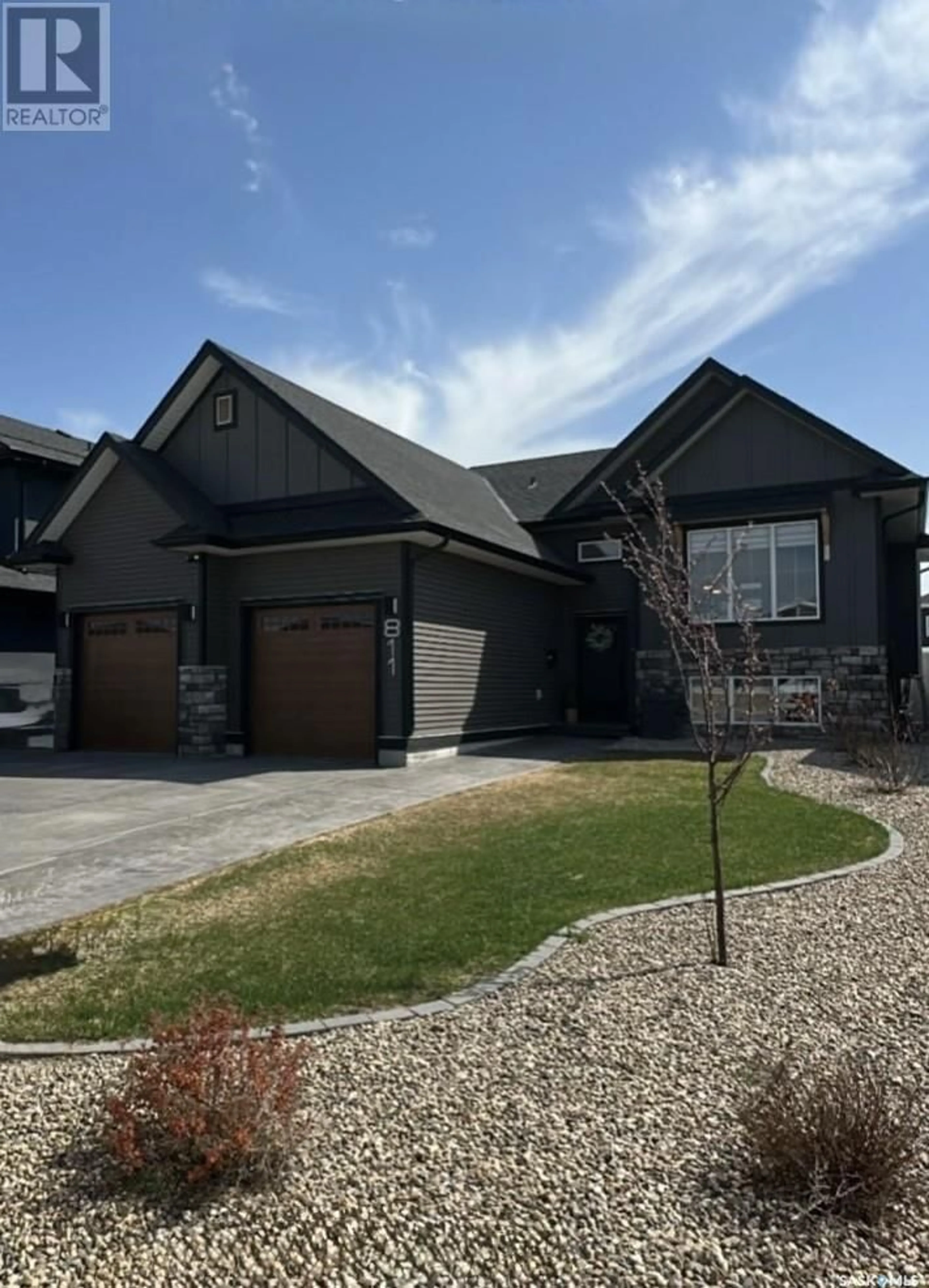 Home with brick exterior material, street for 811 WEIR CRESCENT, Warman Saskatchewan S0K4S4