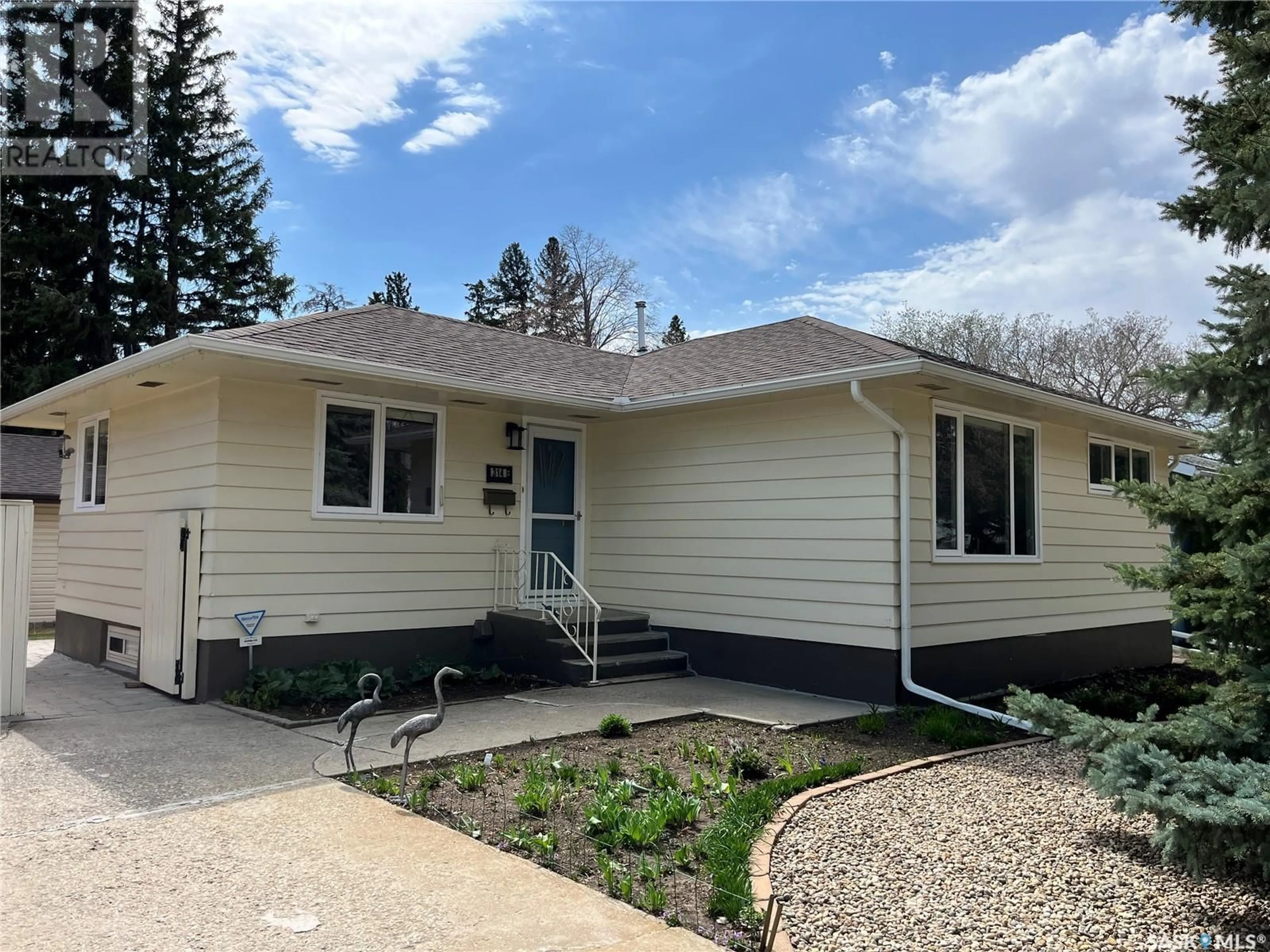 Home with vinyl exterior material, street for 314 ADELAIDE STREET E, Saskatoon Saskatchewan S7J0H7