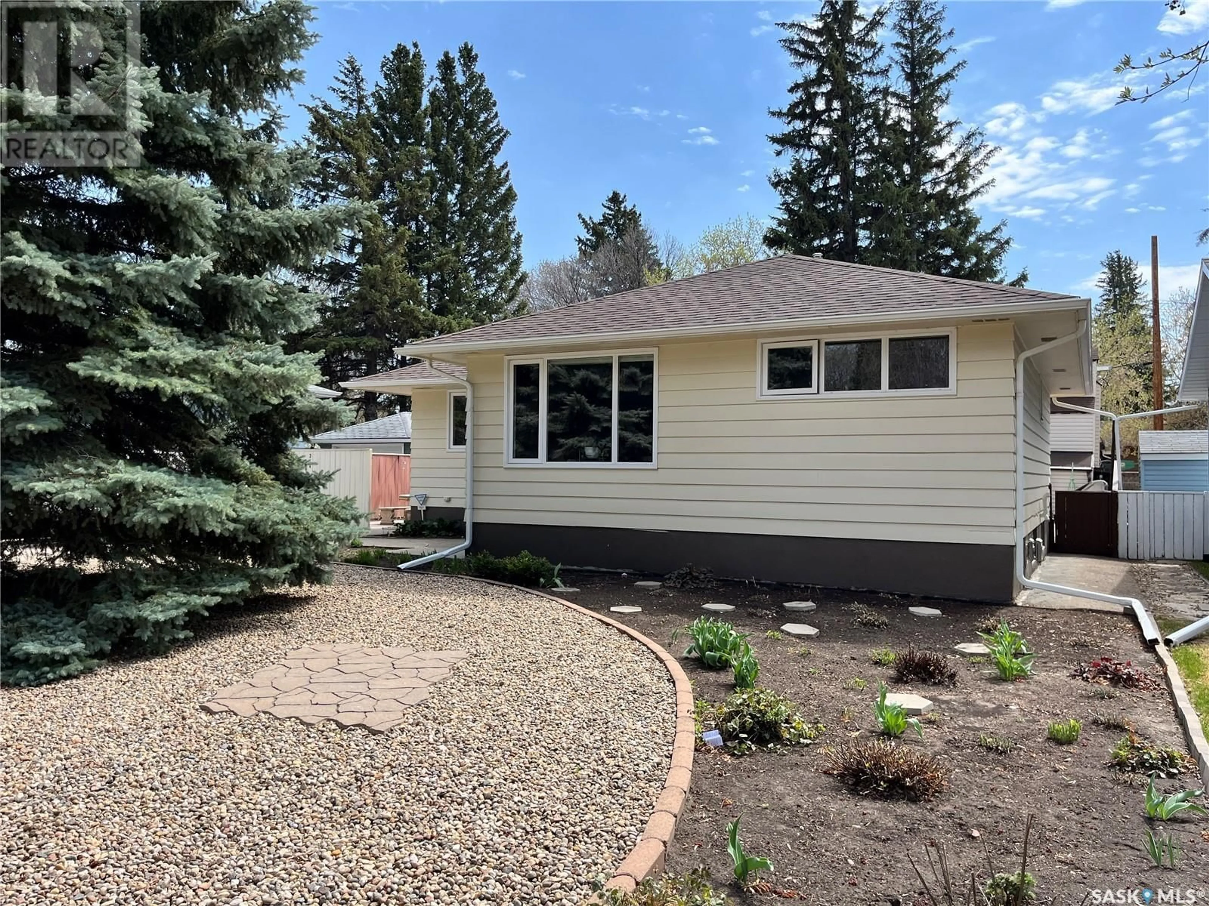 Home with vinyl exterior material, street for 314 ADELAIDE STREET E, Saskatoon Saskatchewan S7J0H7