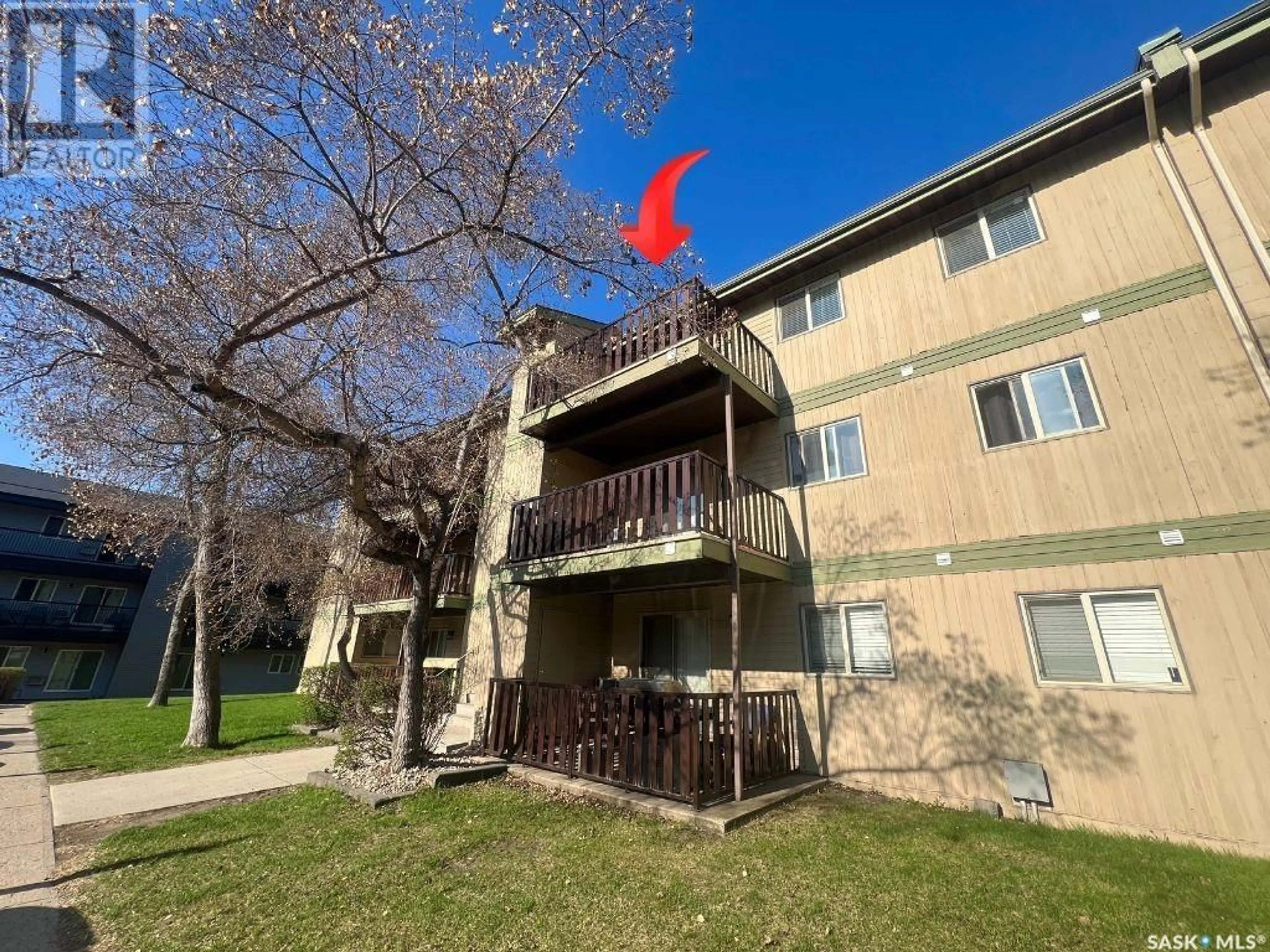 A pic from outside/outdoor area/front of a property/back of a property/a pic from drone, unknown for 306F - 1121 MCKERCHER DRIVE, Saskatoon Saskatchewan S7H5B8