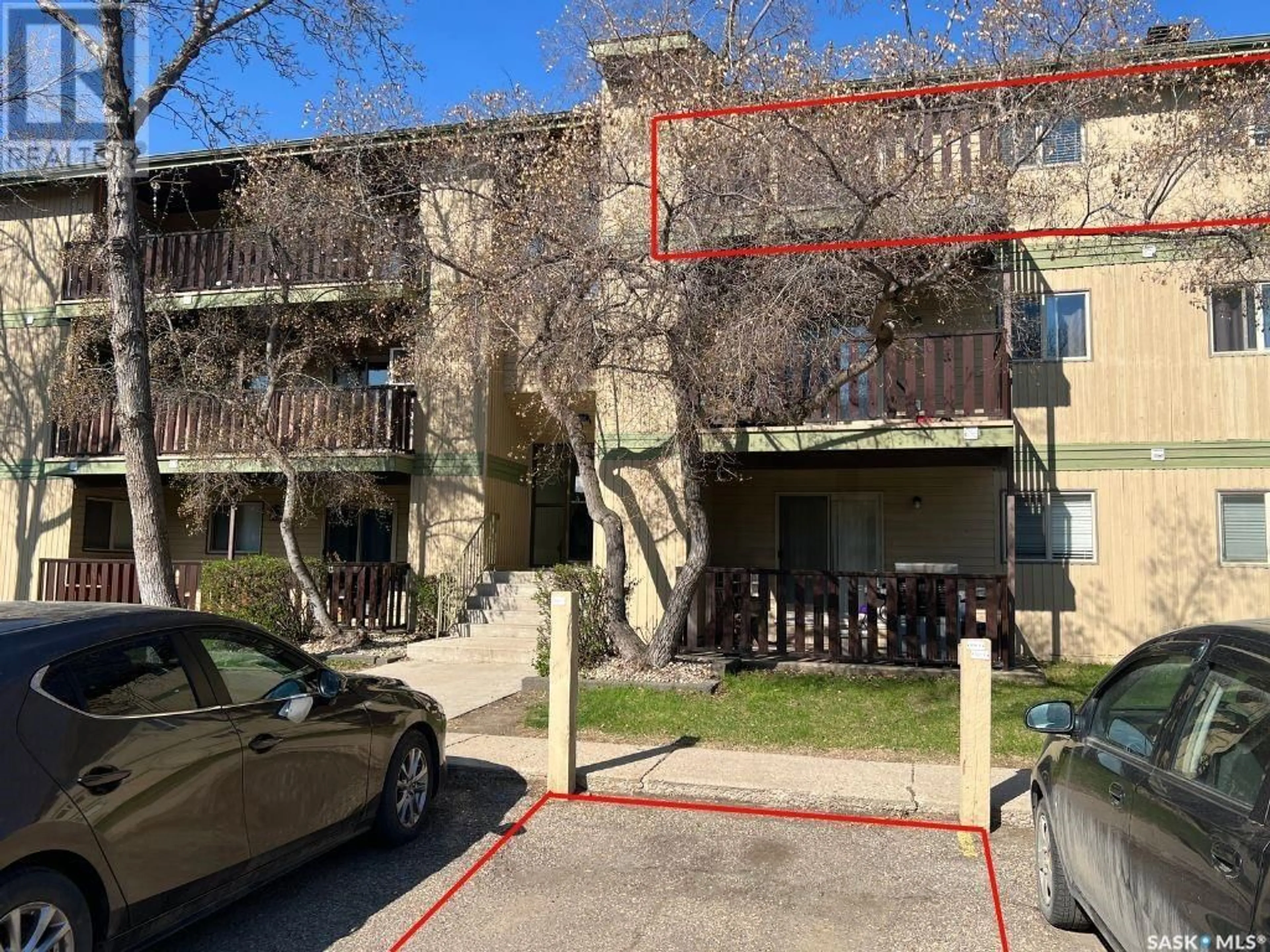 A pic from outside/outdoor area/front of a property/back of a property/a pic from drone, street for 306F - 1121 MCKERCHER DRIVE, Saskatoon Saskatchewan S7H5B8