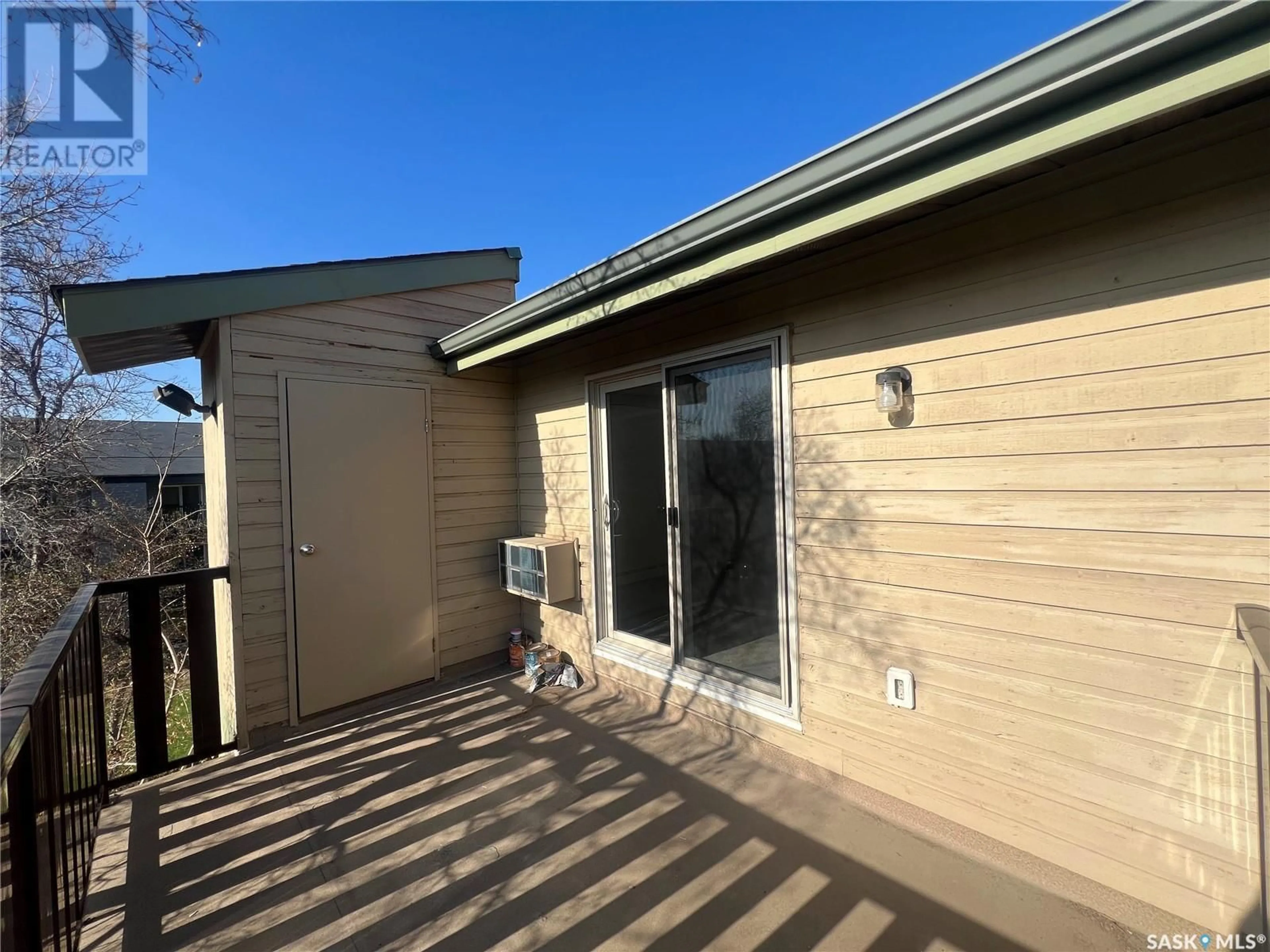 Patio, water/lake/river/ocean view for 306F - 1121 MCKERCHER DRIVE, Saskatoon Saskatchewan S7H5B8
