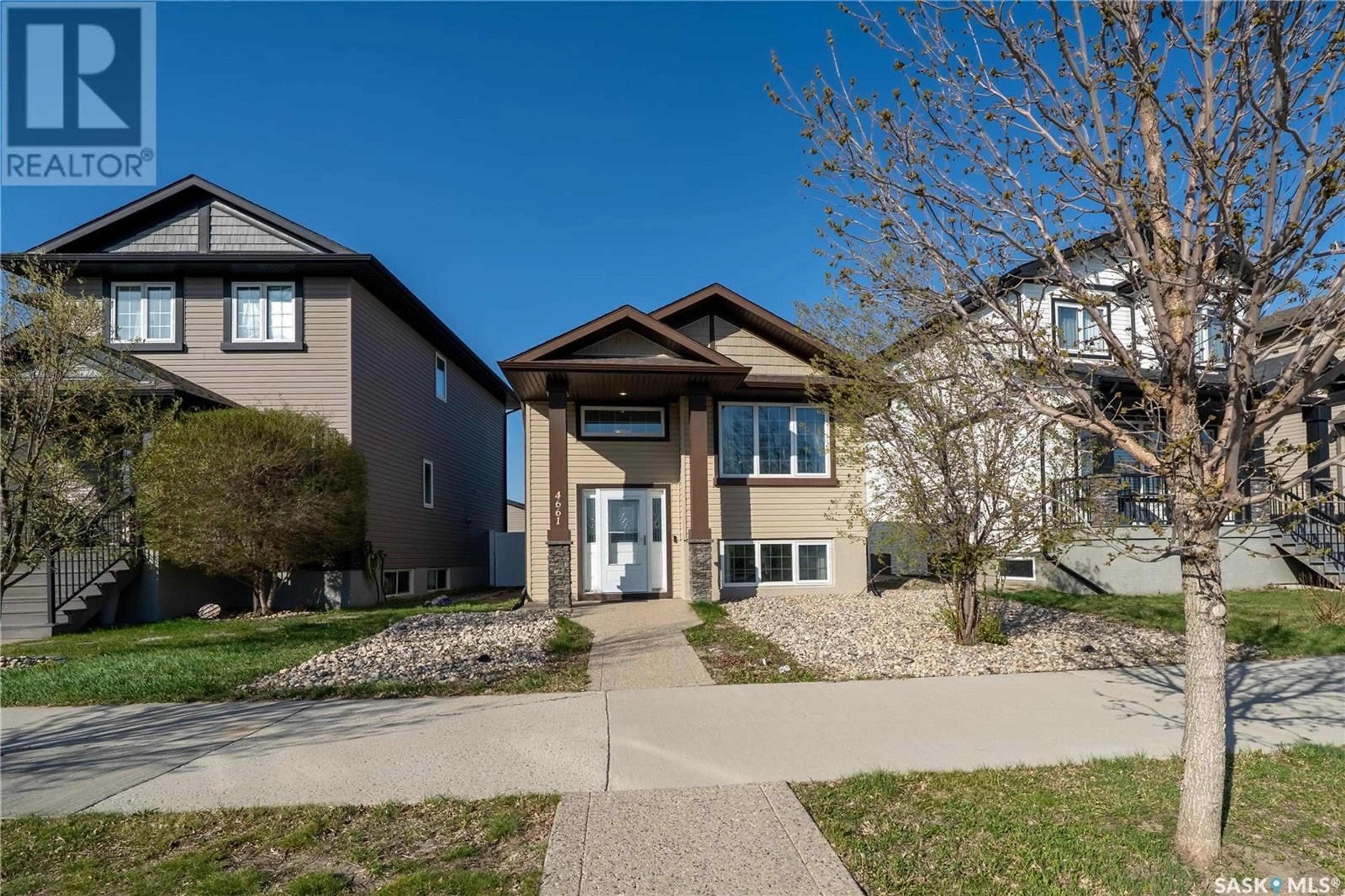 Home with brick exterior material, street for 4661 JAMES HILL ROAD, Regina Saskatchewan S4W0C7