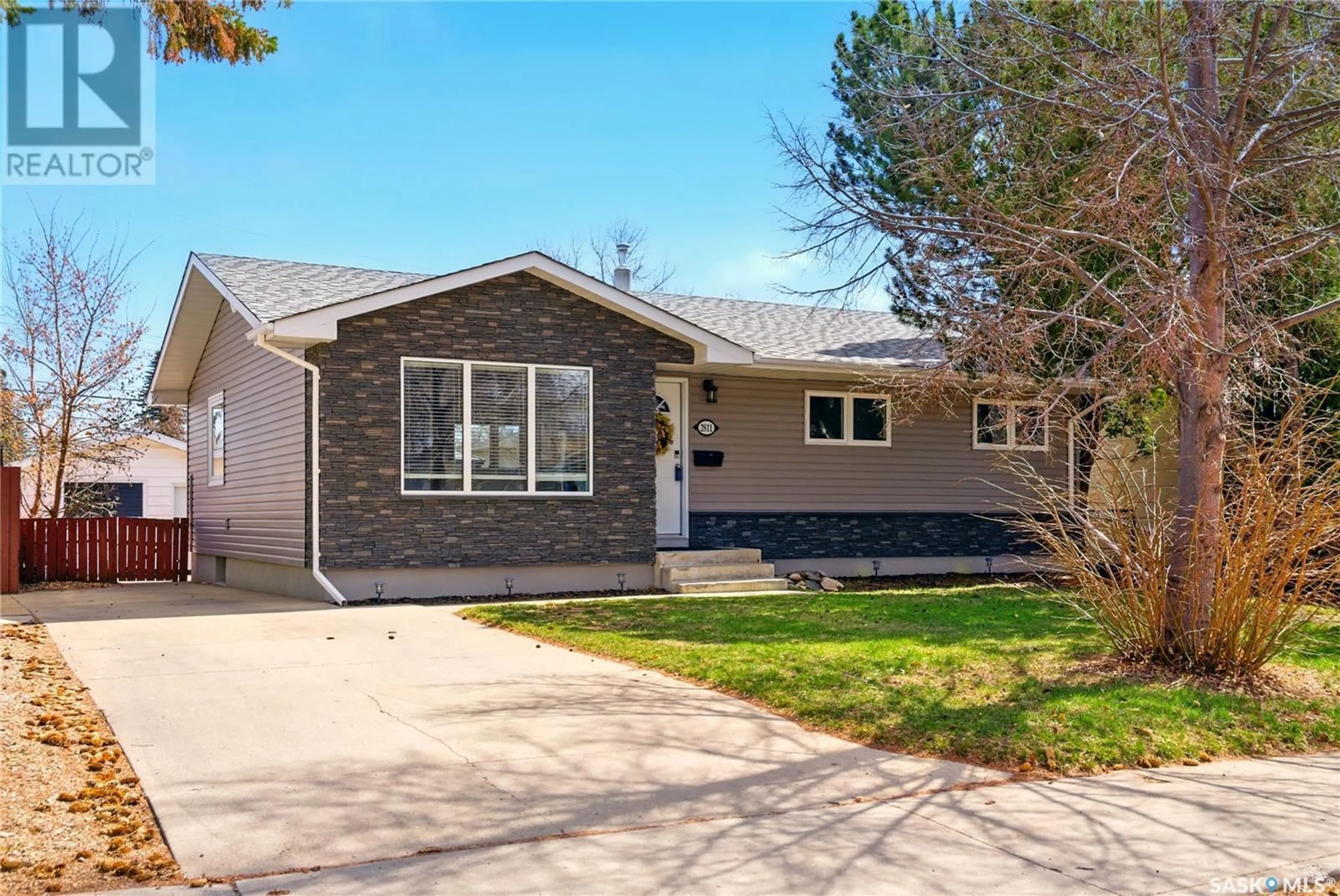 Home with vinyl exterior material, street for 2811 IRVINE AVENUE, Saskatoon Saskatchewan S7J2B4