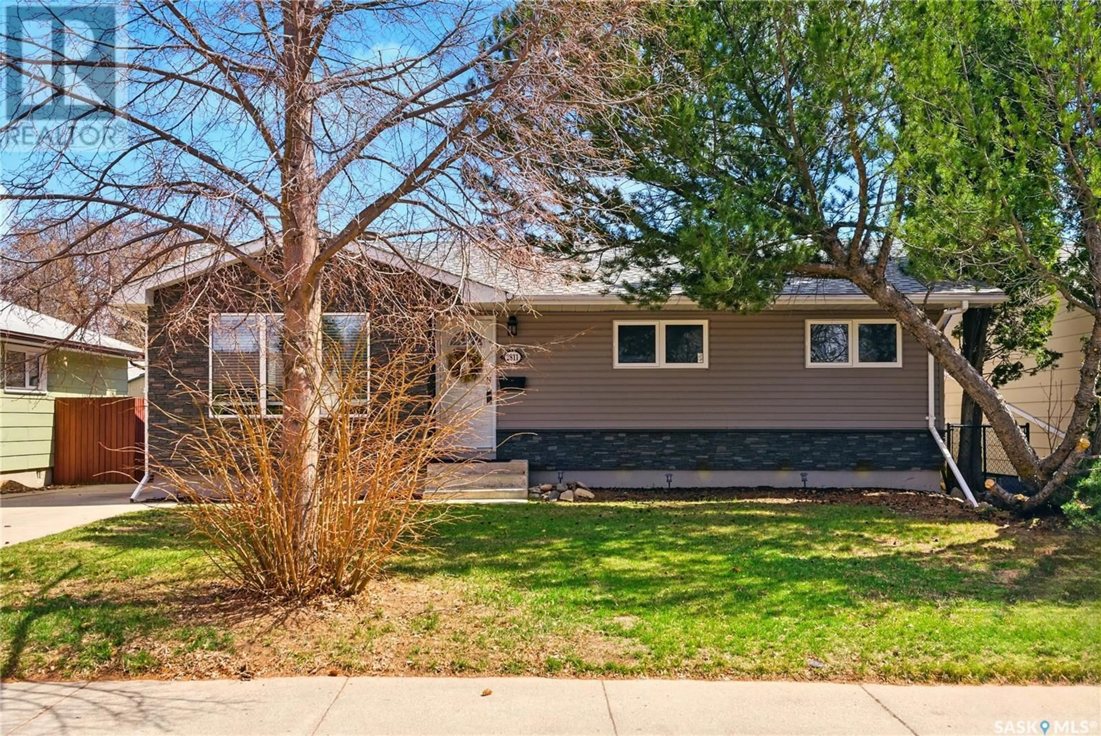 Home with vinyl exterior material, street for 2811 IRVINE AVENUE, Saskatoon Saskatchewan S7J2B4