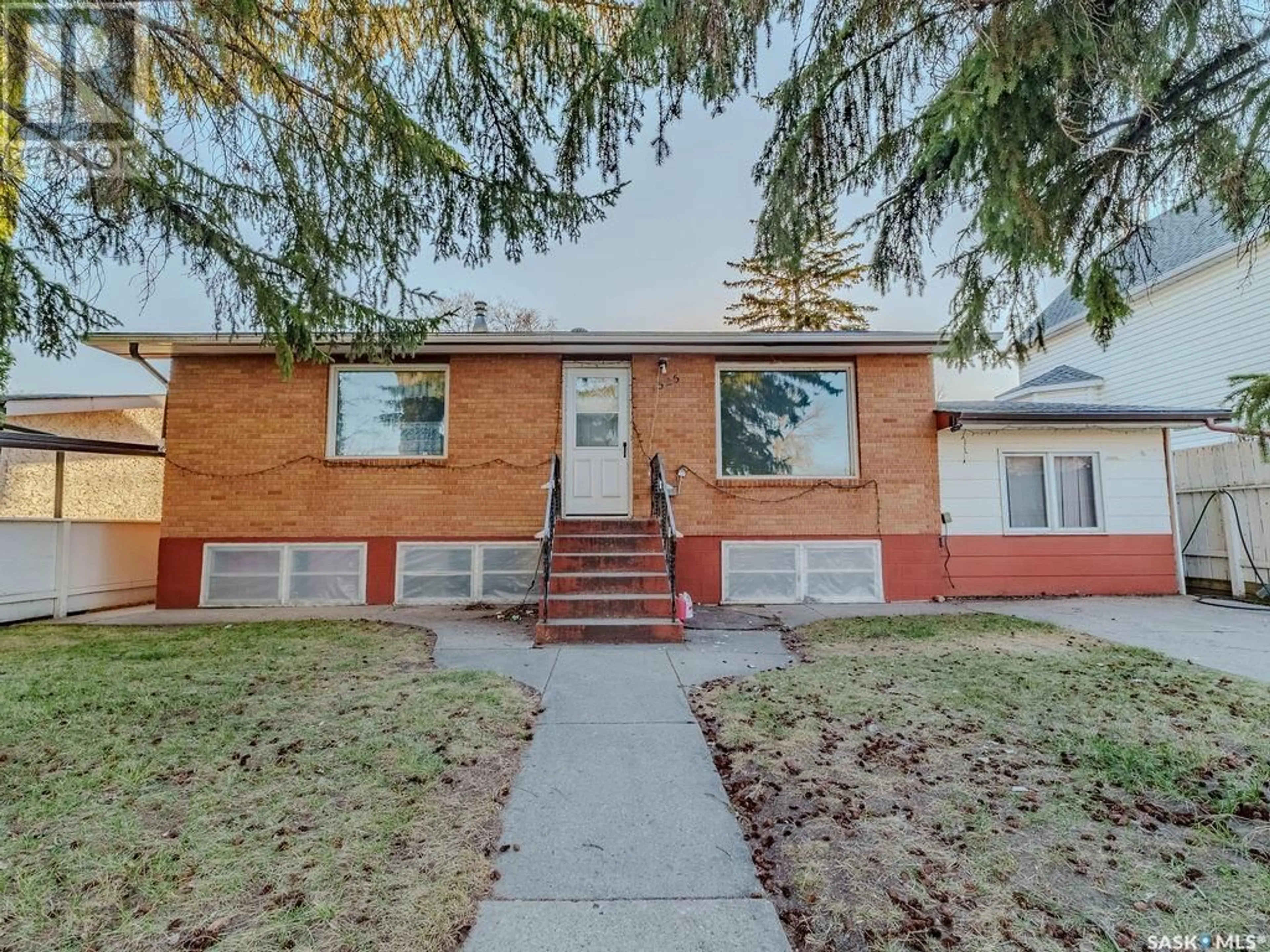 Home with brick exterior material, street for 1525 EMPRESS AVENUE, Saskatoon Saskatchewan S7K3G4