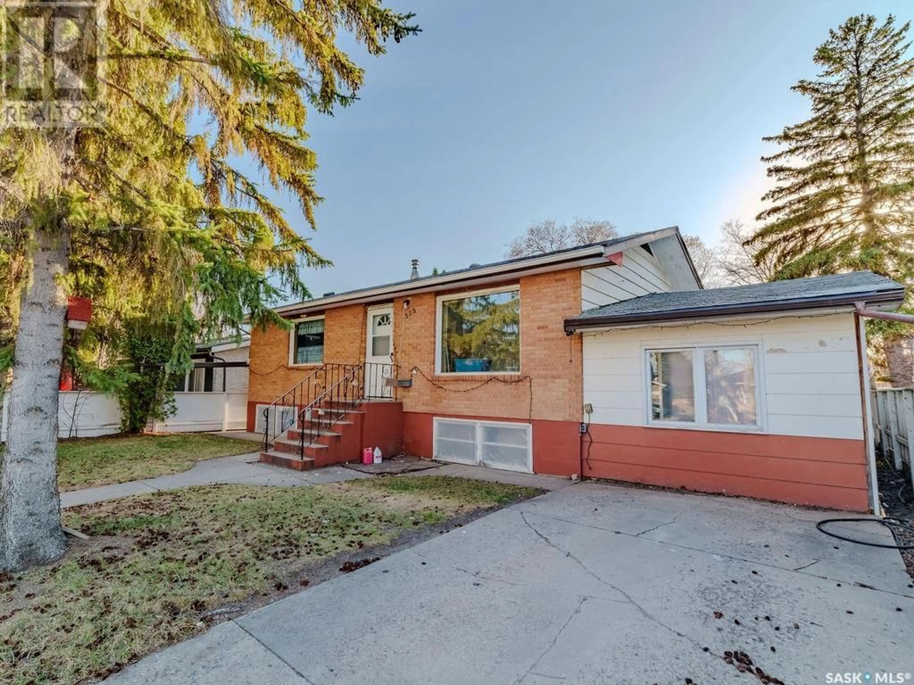 Home with brick exterior material, street for 1525 EMPRESS AVENUE, Saskatoon Saskatchewan S7K3G4