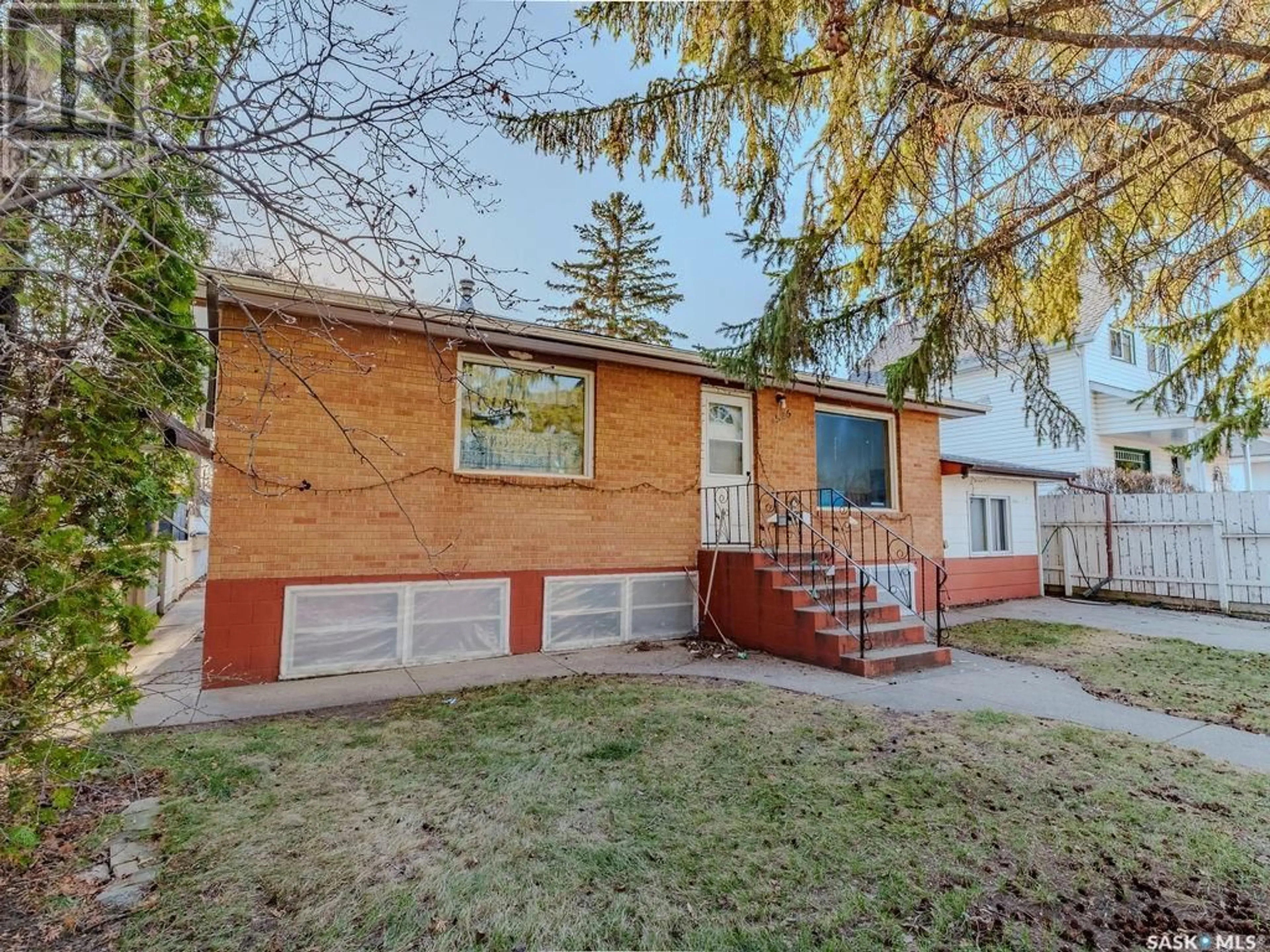 Home with brick exterior material, street for 1525 EMPRESS AVENUE, Saskatoon Saskatchewan S7K3G4