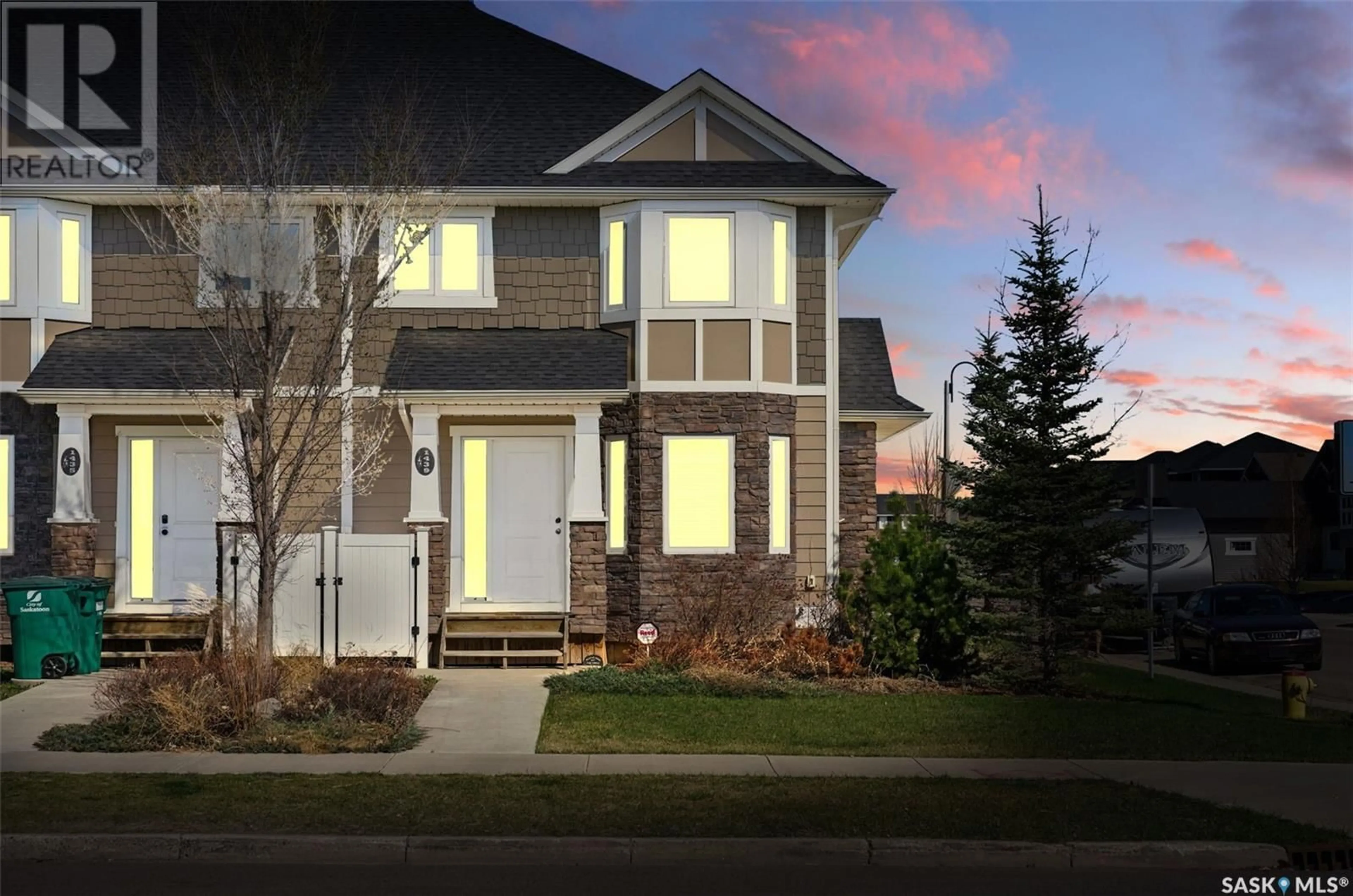 Home with vinyl exterior material, street for 1439 HUNTER ROAD, Saskatoon Saskatchewan S7T0T4