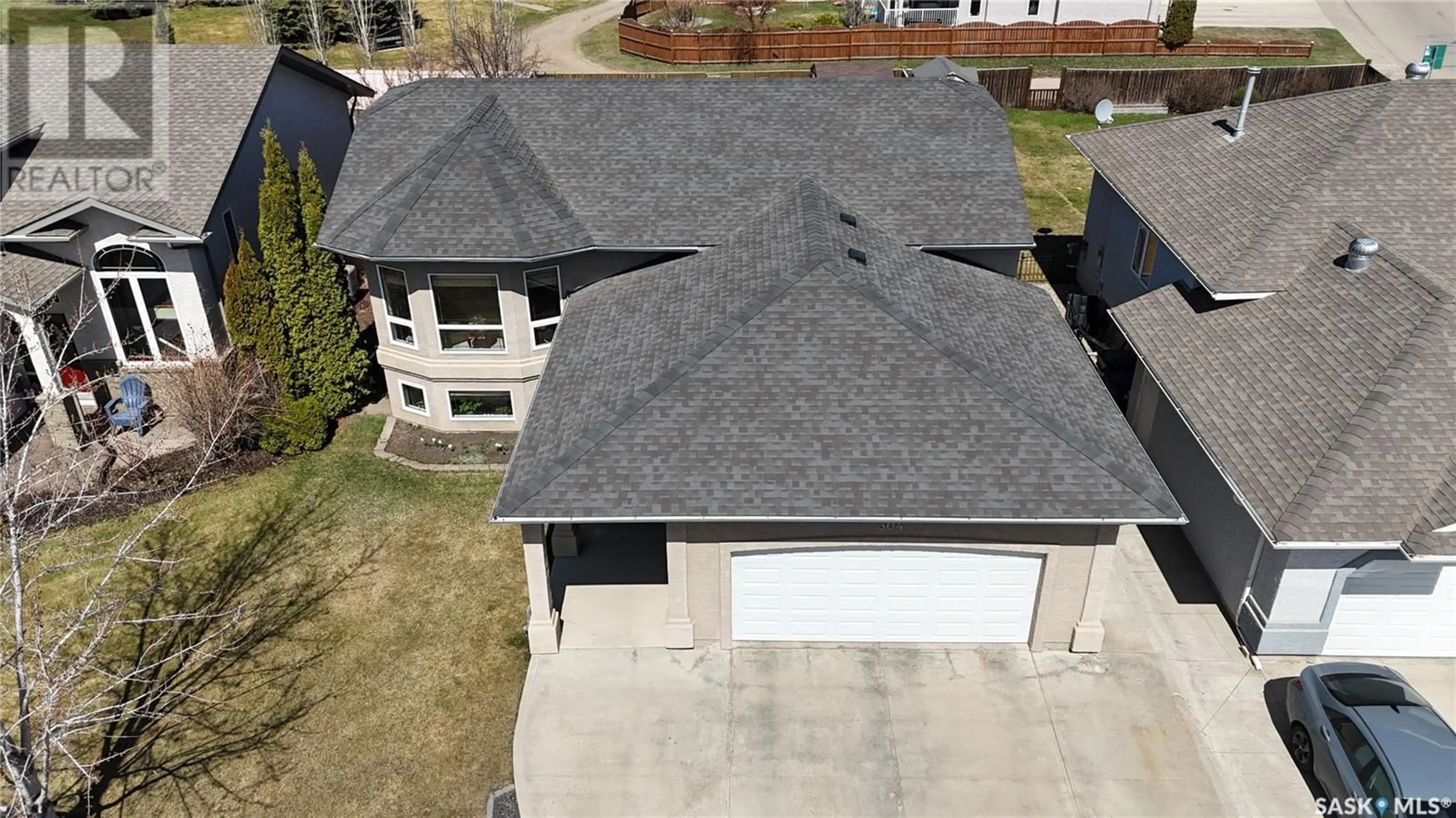 A pic from outside/outdoor area/front of a property/back of a property/a pic from drone, street for 304 BROOKLYN CRESCENT, Warman Saskatchewan S0K0A1