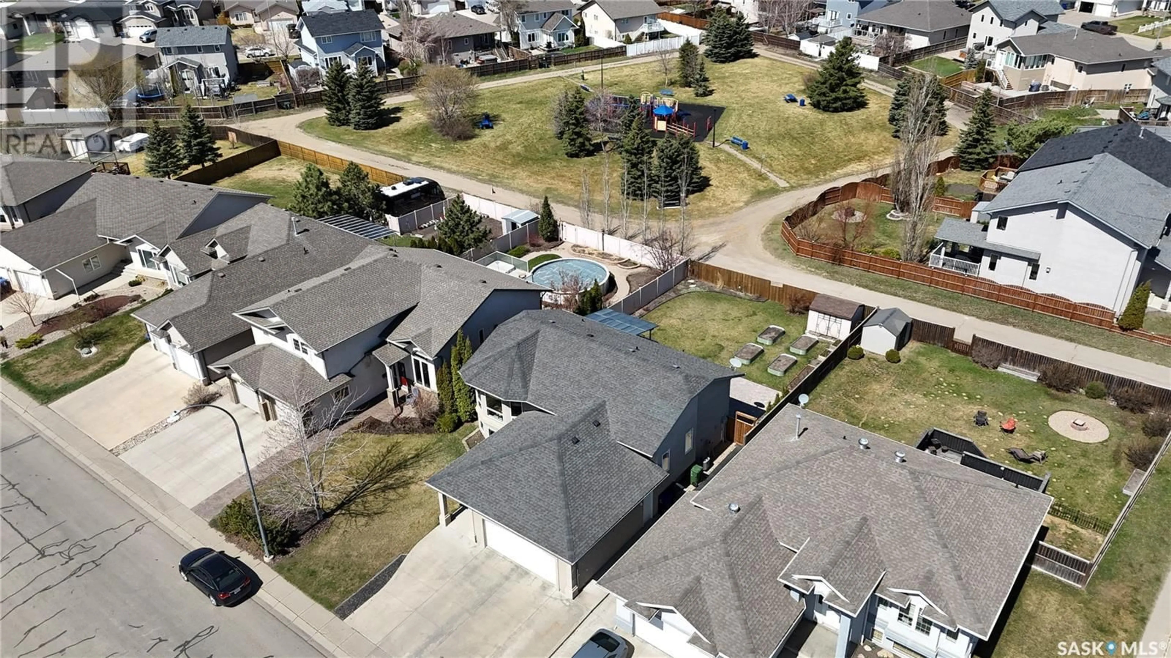 A pic from outside/outdoor area/front of a property/back of a property/a pic from drone, street for 304 BROOKLYN CRESCENT, Warman Saskatchewan S0K0A1