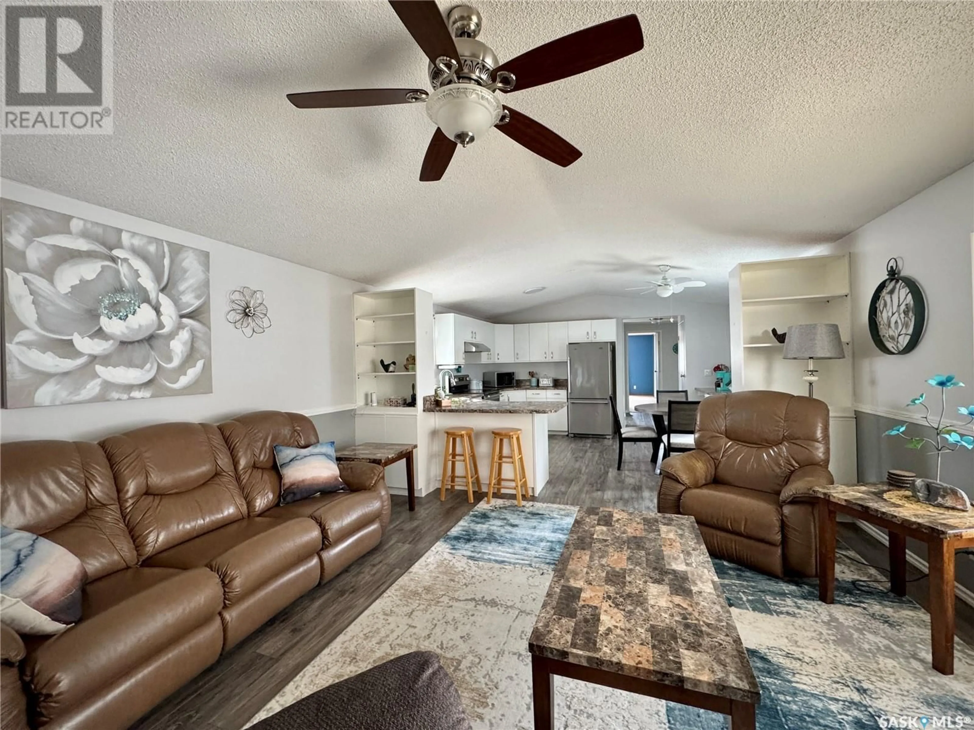 Living room with furniture, unknown for E - 317 RIEDEL AVENUE, Langenburg Saskatchewan S0A2A0