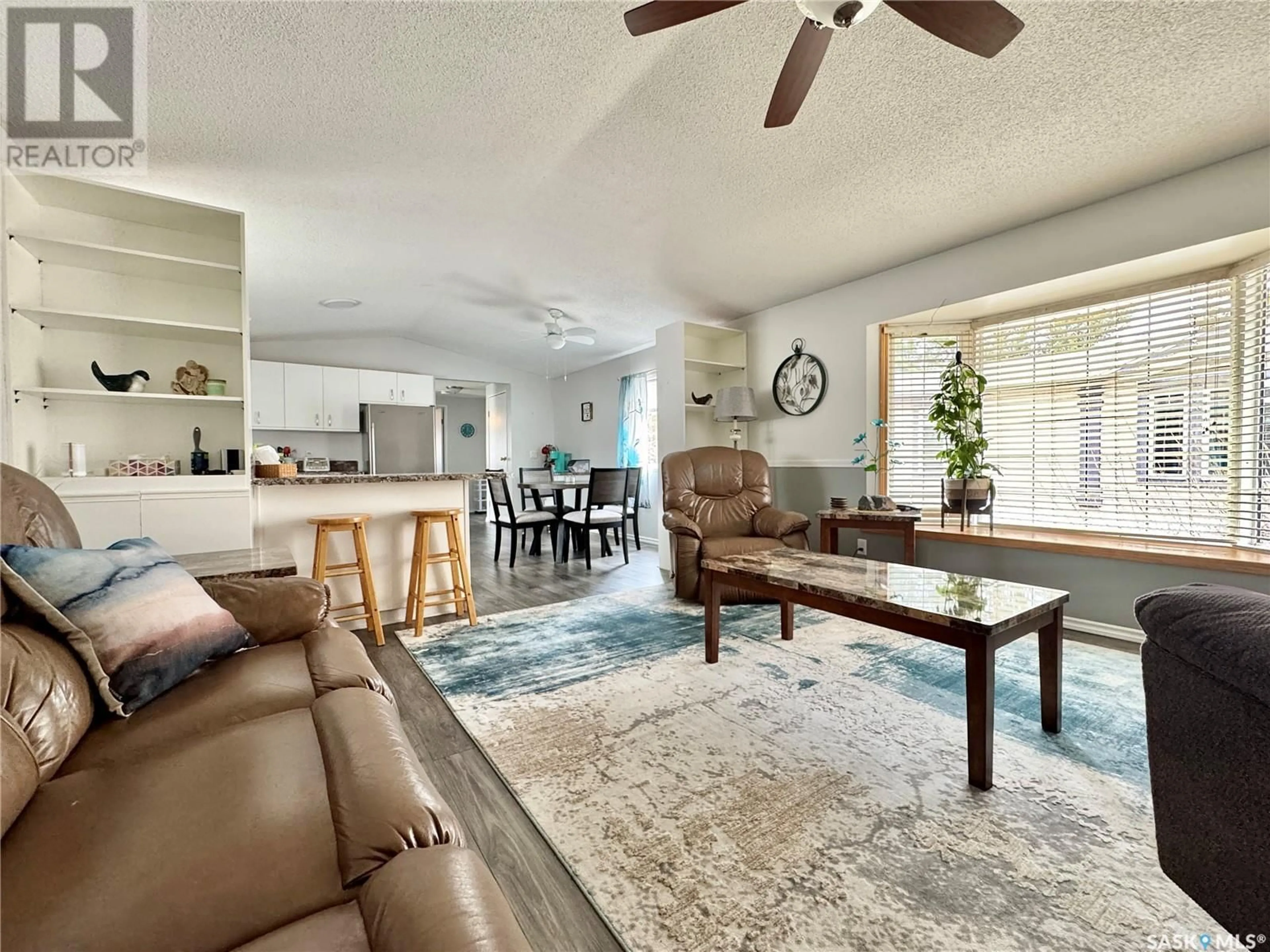 Living room with furniture, unknown for E - 317 RIEDEL AVENUE, Langenburg Saskatchewan S0A2A0