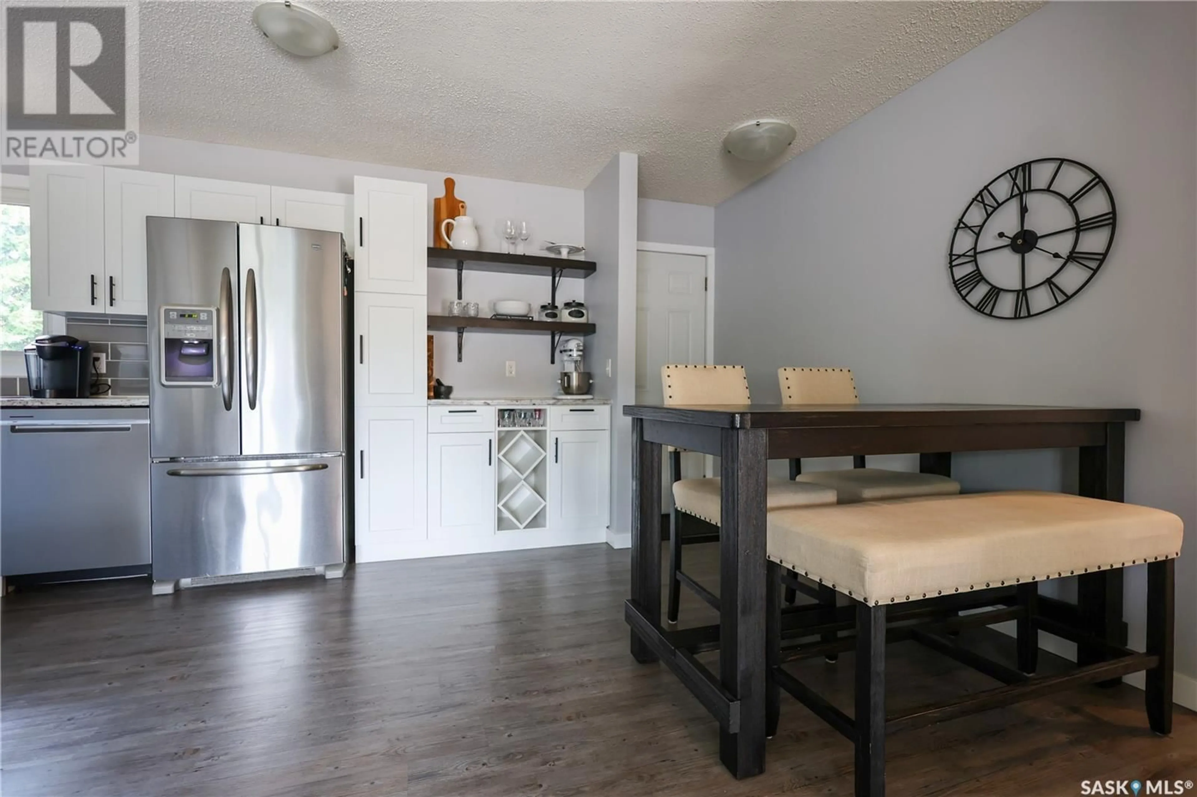 Open concept kitchen, wood/laminate floor for 723 MCCRANEY CRESCENT, Prince Albert Saskatchewan S6V6W3